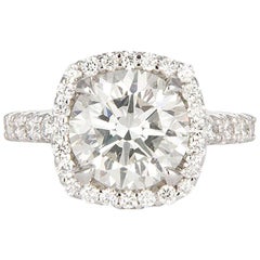 white gold rings EGL Hearts
Arrows 18 Karat White Gold and Diamond Halo Ring 4.00 Carat H/SI1