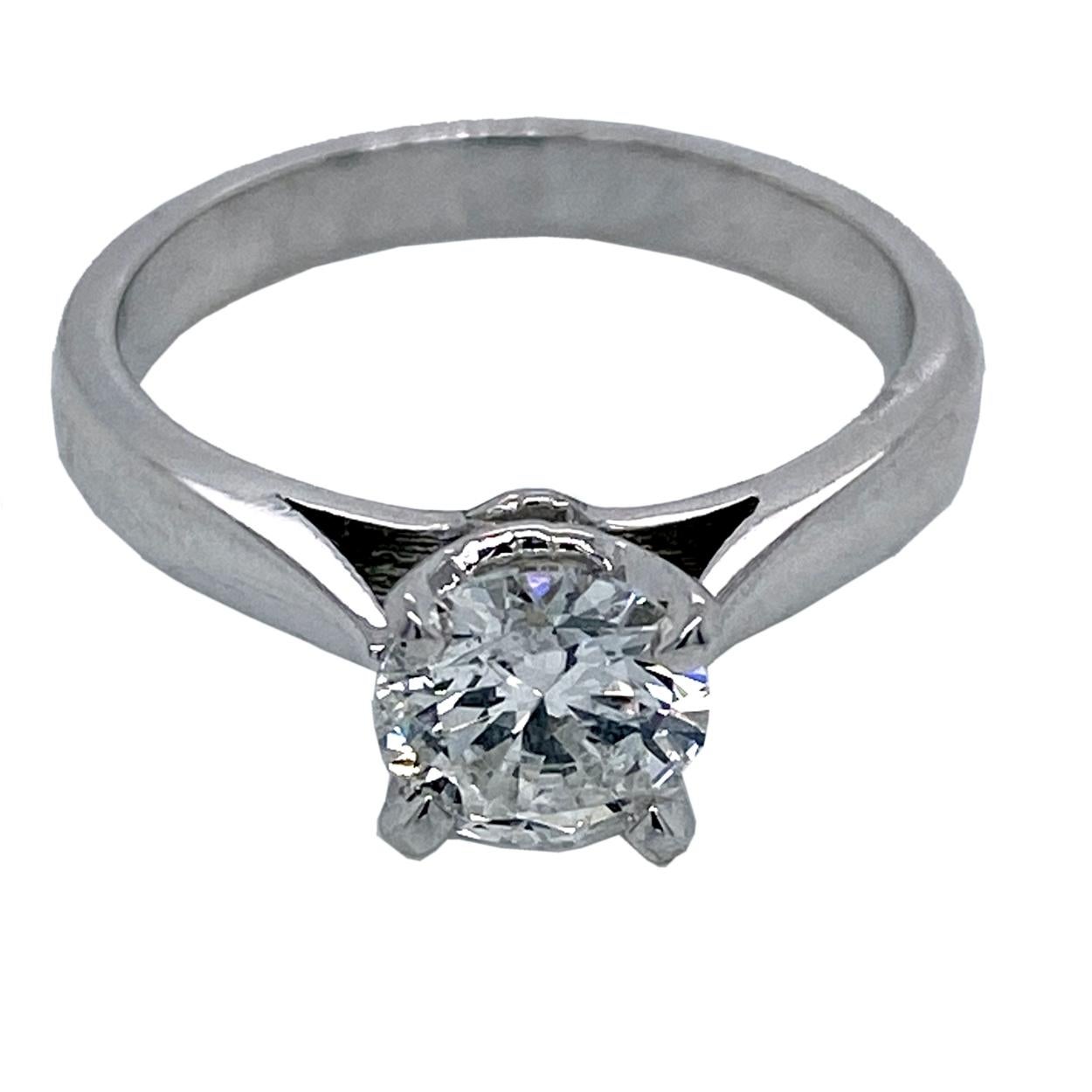 A very nice 1.00 Ct Round Brilliant F-G/SI3 EGL US certified center Diamond set in a 14K White Gold Solitaire Engagement Ring. 

Diamond specs:
Center stone: 1.00 Ct EGL US Certified F-G/SI3 Round Brilliant natural diamond
Center dimensions 6.42 mm