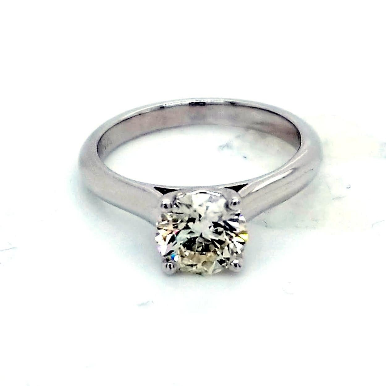 A very fine 1.31 Ct Round Brilliant I-J/SI3 EGL US certified center Diamond set in a 14K White Gold Solitaire Engagement Ring. 

Diamond specs:
Center stone: 1.31 Ct EGL US Certified I-J/SI3 Round Brilliant natural diamond
Center dimensions 6.96 mm