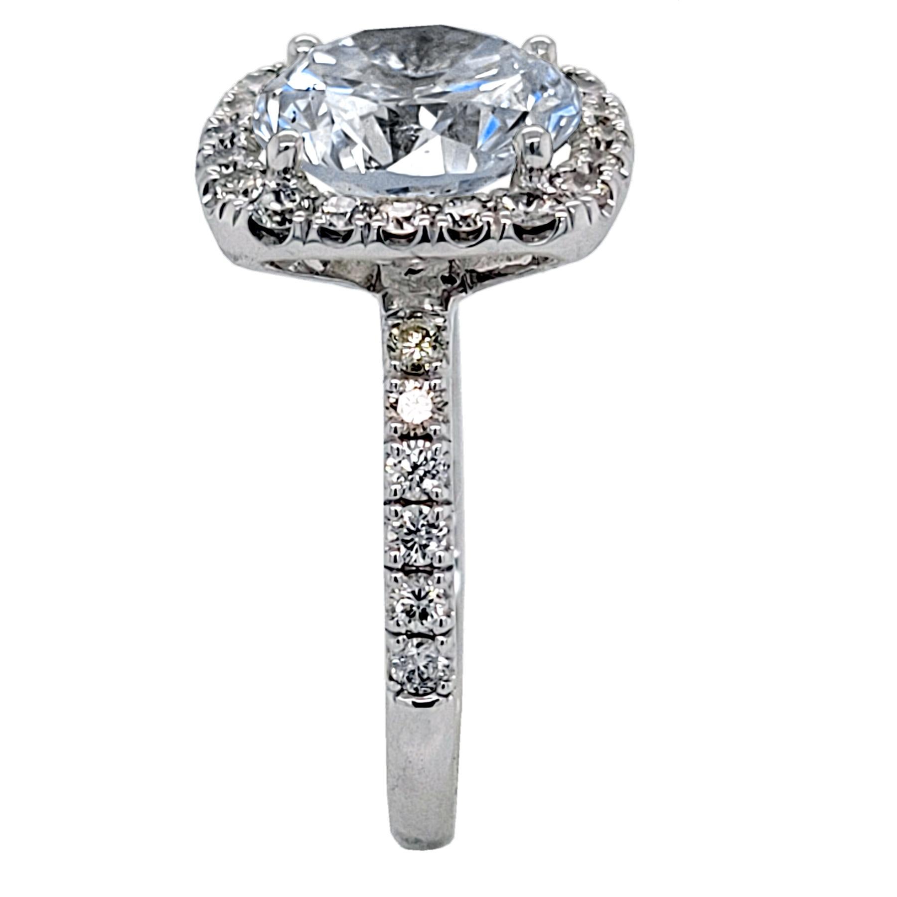 Contemporary EGL US 3.87 Carat I/SI1 Round Brilliant Diamond 18 Karat Pave Set Ring with Halo For Sale