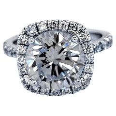 EGL US 3.87 Carat I/SI1 Round Brilliant Diamond 18 Karat Pave Set Ring with Halo