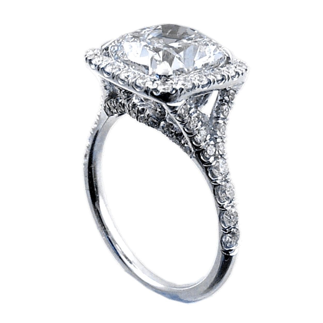 Contemporary EGL US 4.06 Carat K/SI1 Cushion Platinum Pave Set Diamond Ring with Halo