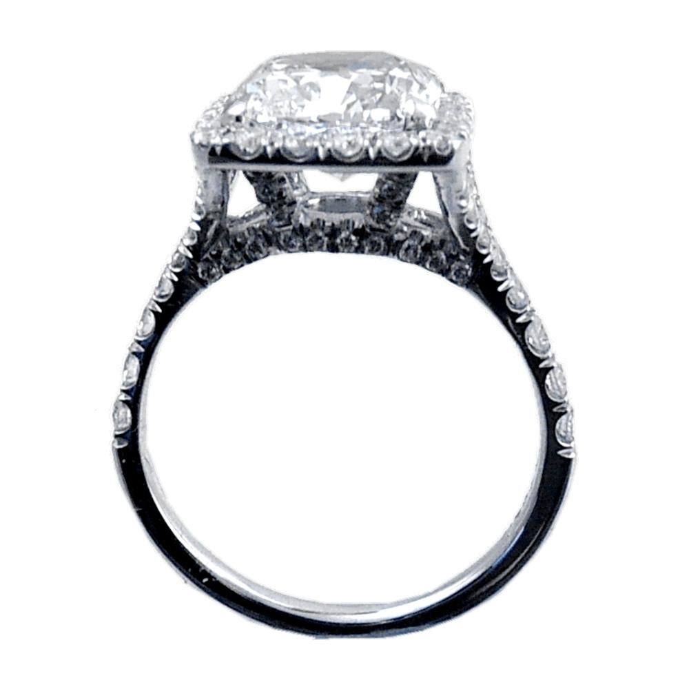 EGL US 4.06 Carat K/SI1 Cushion Platinum Pave Set Diamond Ring with Halo In New Condition In Los Angeles, CA