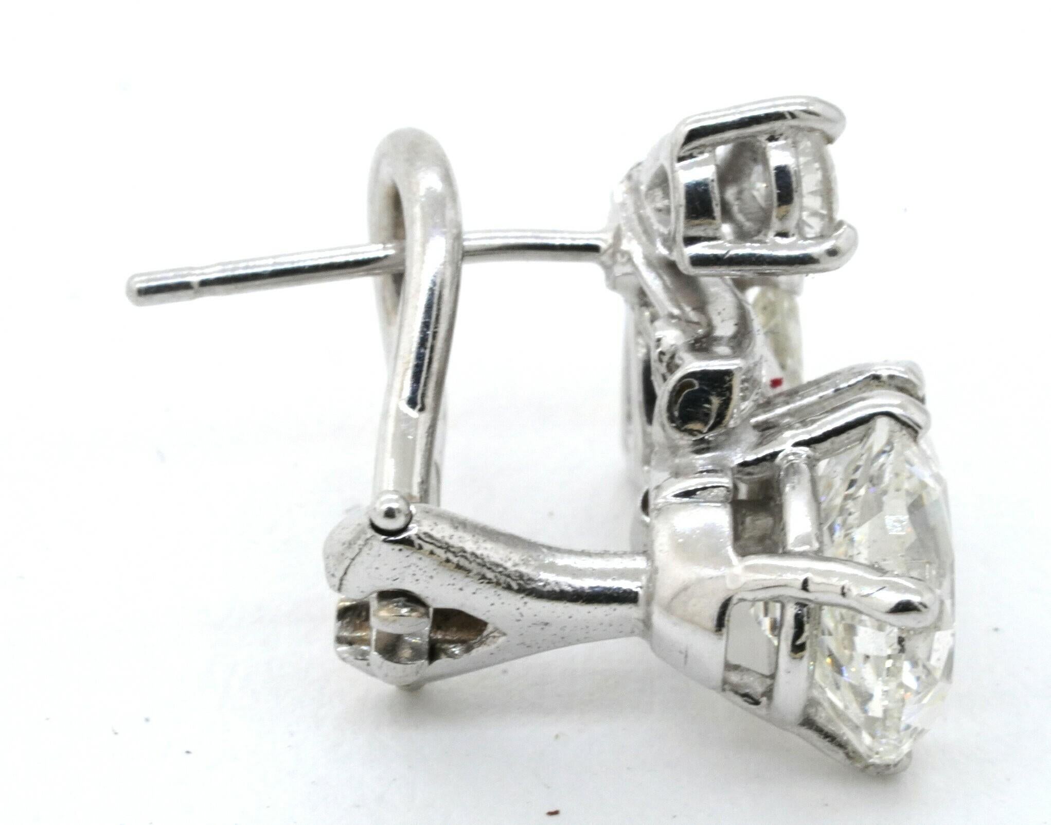 Contemporary EGL USA 1950s Platinum 4.54CT VS-SI Pear Diamond Earrings w/ Approx. 1.5CT Ctrs. For Sale
