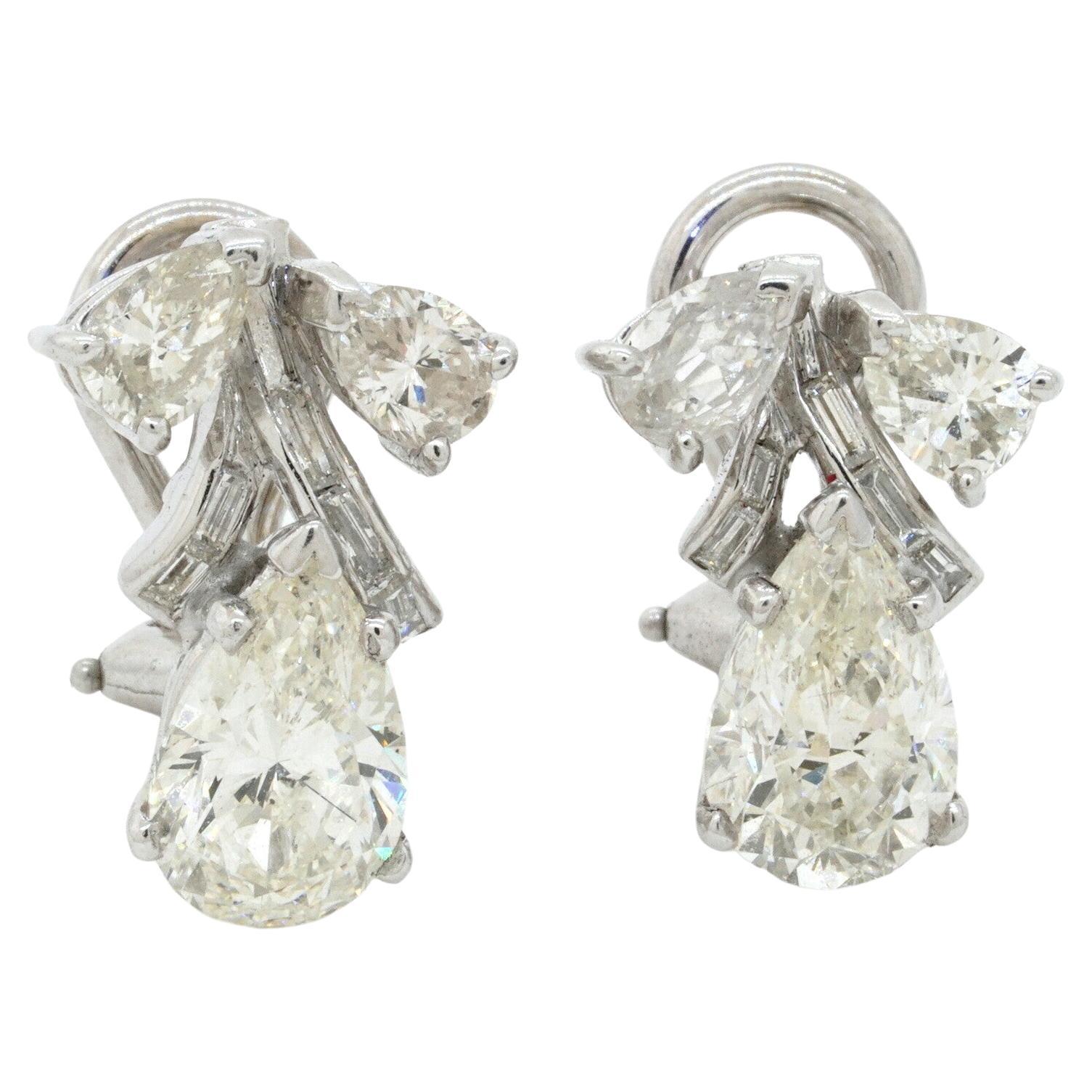 EGL USA 1950s Platinum 4.54CT VS-SI Pear Diamond Earrings w/ Approx. 1.5CT Ctrs. For Sale