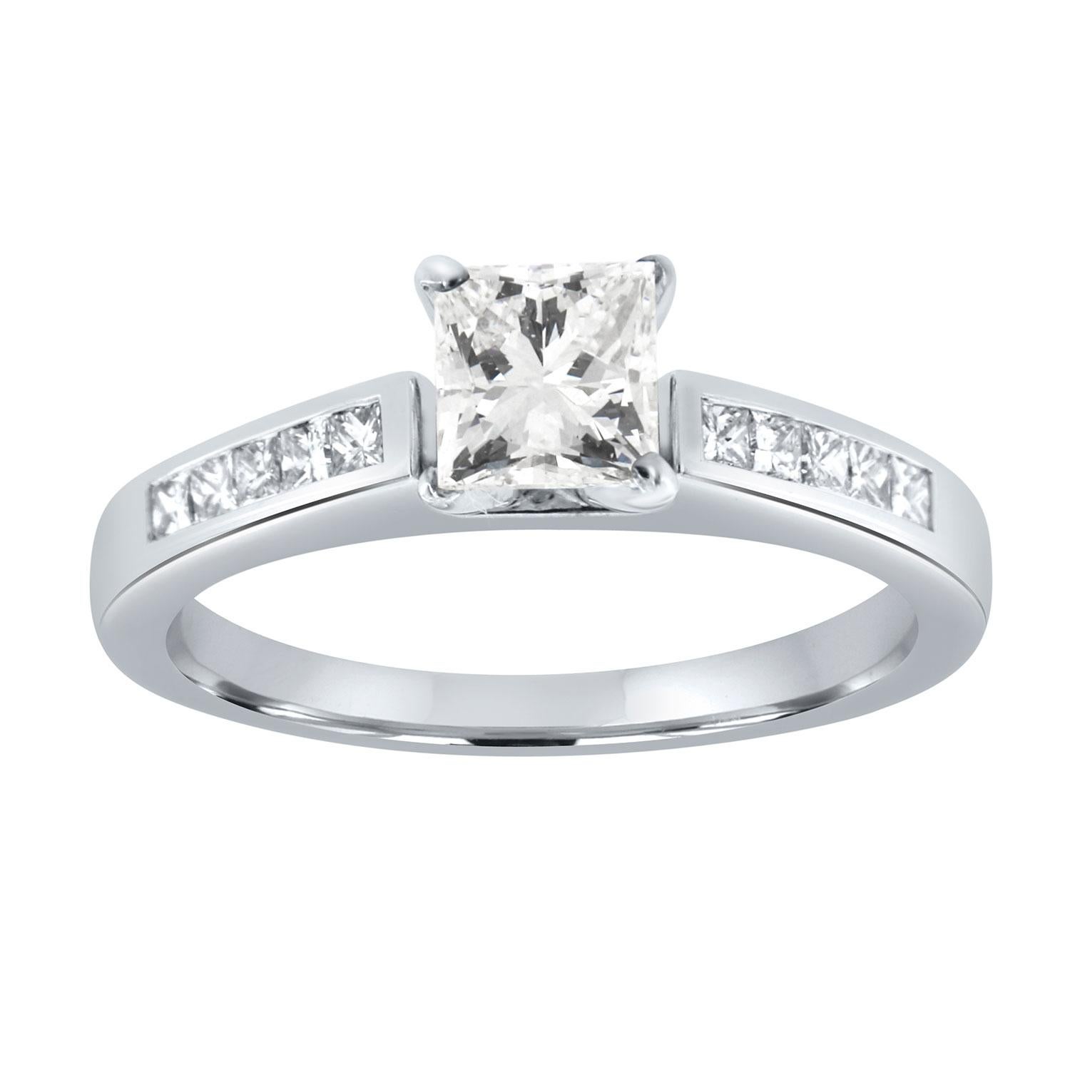 This 18k white gold ring features a 0.71 Carat Princes-shaped Natural Diamond EGL USA Certified as G color and VS2 in clarity with an excellent luster on a 2.5 mm wide Diamond band. A perfectly matched diamond band that contains a princess cut