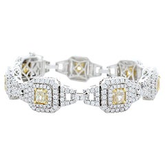 EGL USA Certified 7.73 Carat Total Cushion Cut Yellow Diamond Bracelet In 18K