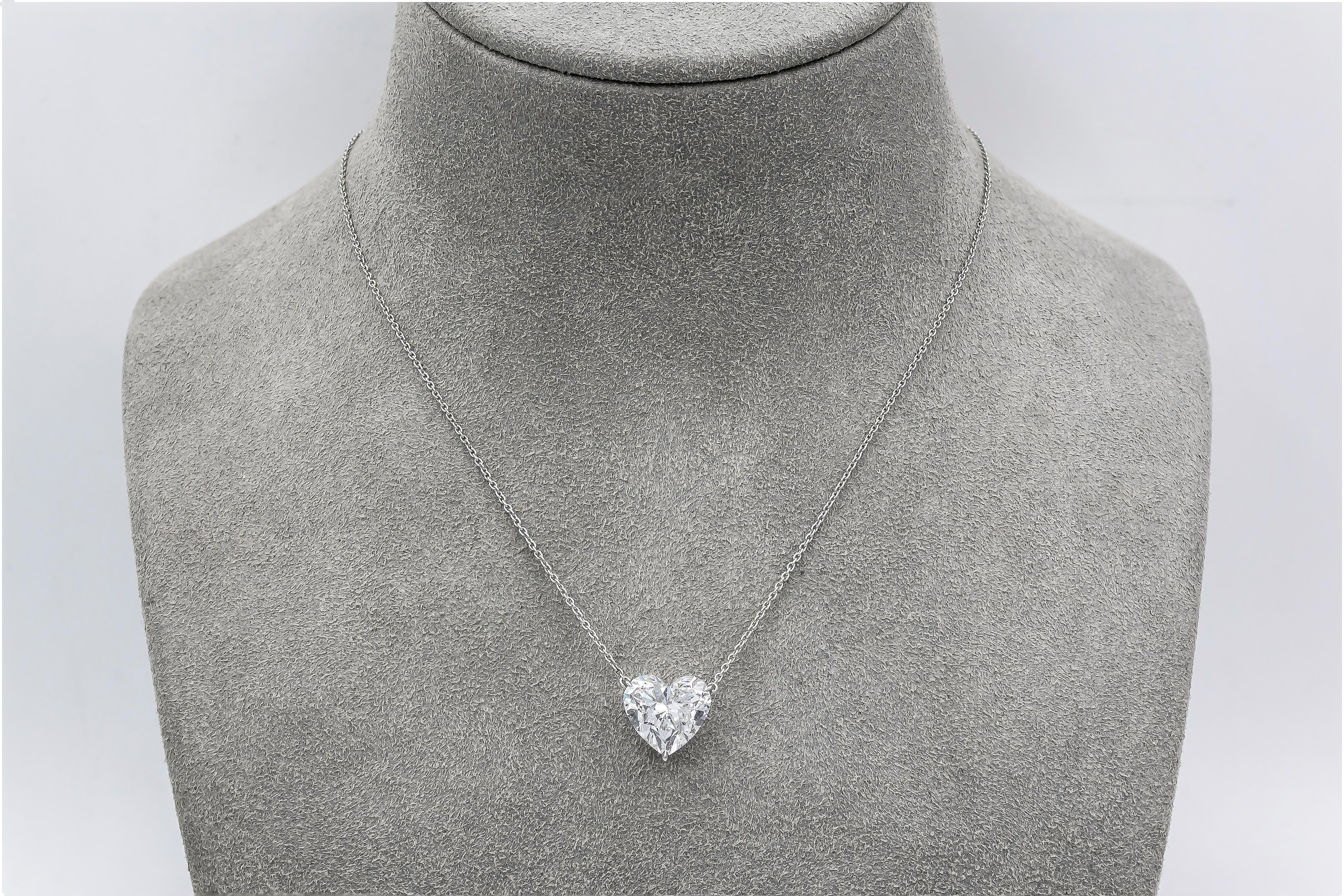 A traditional and classic pendant necklace style showcasing a 5.23 carat heart shape diamond, set in a polished platinum mounting. EGL USA certified the diamond as D color, SI2 clarity. 

Style available in different price ranges. Prices are based
