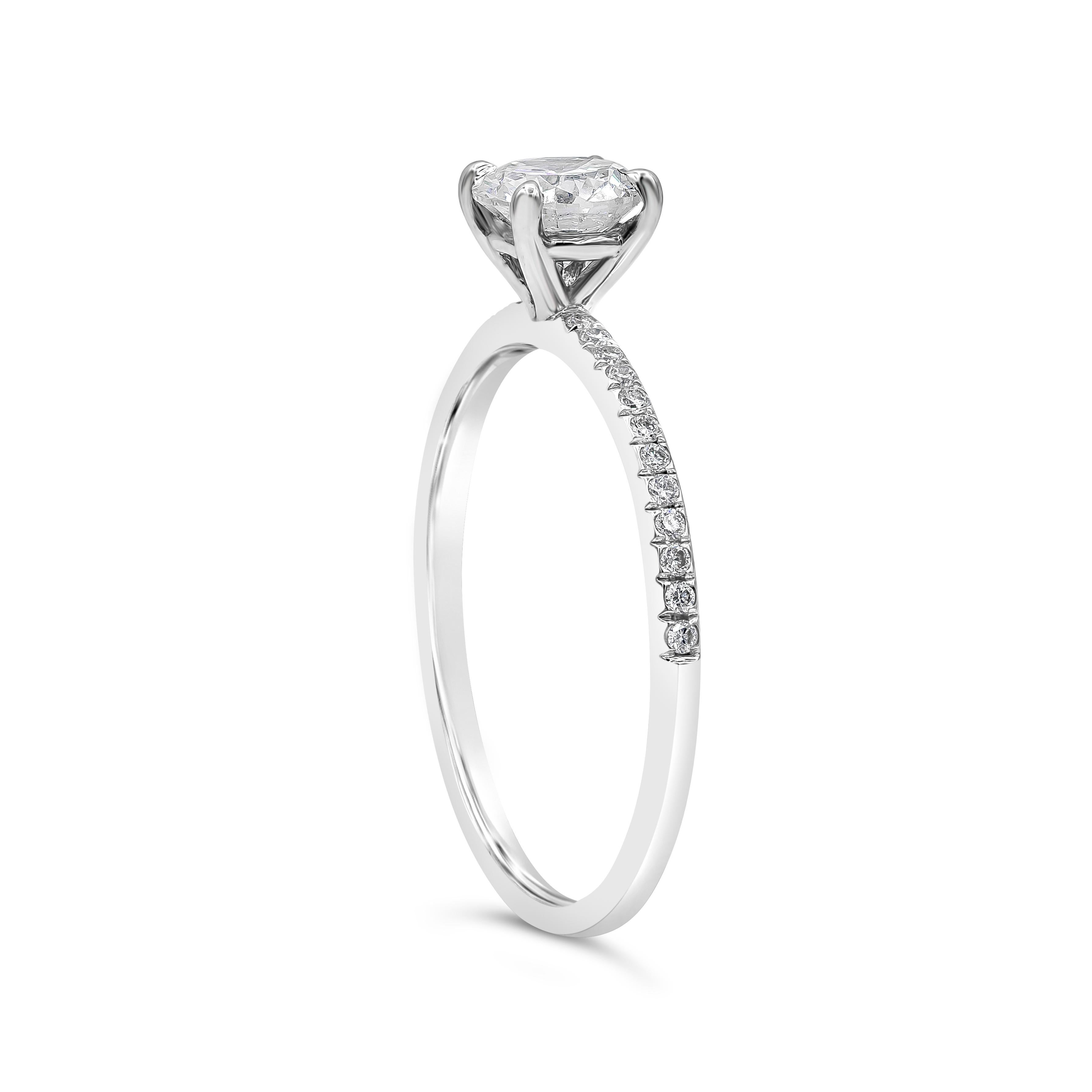 A classic engagement ring style showcasing a 0.58 carat round diamond, certified by EGL USA as F color, SI2 clarity. Set in a diamond encrusted mounting made in 18 karat white gold. Size 6.5 US (Sizable upon request).

Style available in different