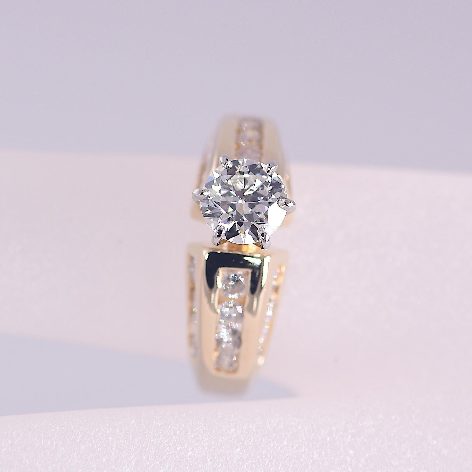 2 TCW with 1 Carat Center Natural Diamond Engagement Ring Yellow Gold 14K

Stones: Natural Diamonds TCW: 2
  Center:   Carat:  1   Color: I   Clarity: VS1   Cut: Round
  Side Stones:   Carat:  1   Color: HIJ   Clarity: I2-I3   Cut: Round
Metal: