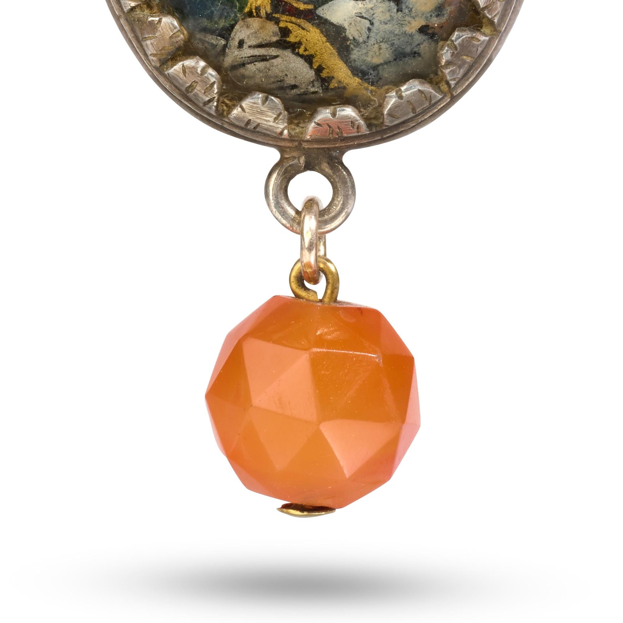 Silver-Mounted Eglomisé Pendant Depicting the Virgin and Child with Reliquary of the True Cross.


Spanish, mid-17th century.

Measurements

• Height: 6.1 cm (including suspension loop and carnelian bead).

• Width: 2.5 cm

• Depth: 1 cm

• Weight: