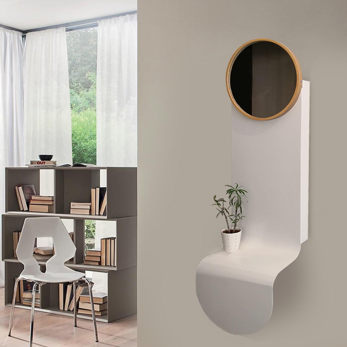 Pink Moon is a multifunctional, linear, refined and attractive furnishing accessory. It contains in a single two versions of itself for two complementary uses. In lacquered iron and wood, it is a mirror with an empty tray in the wall-mounted