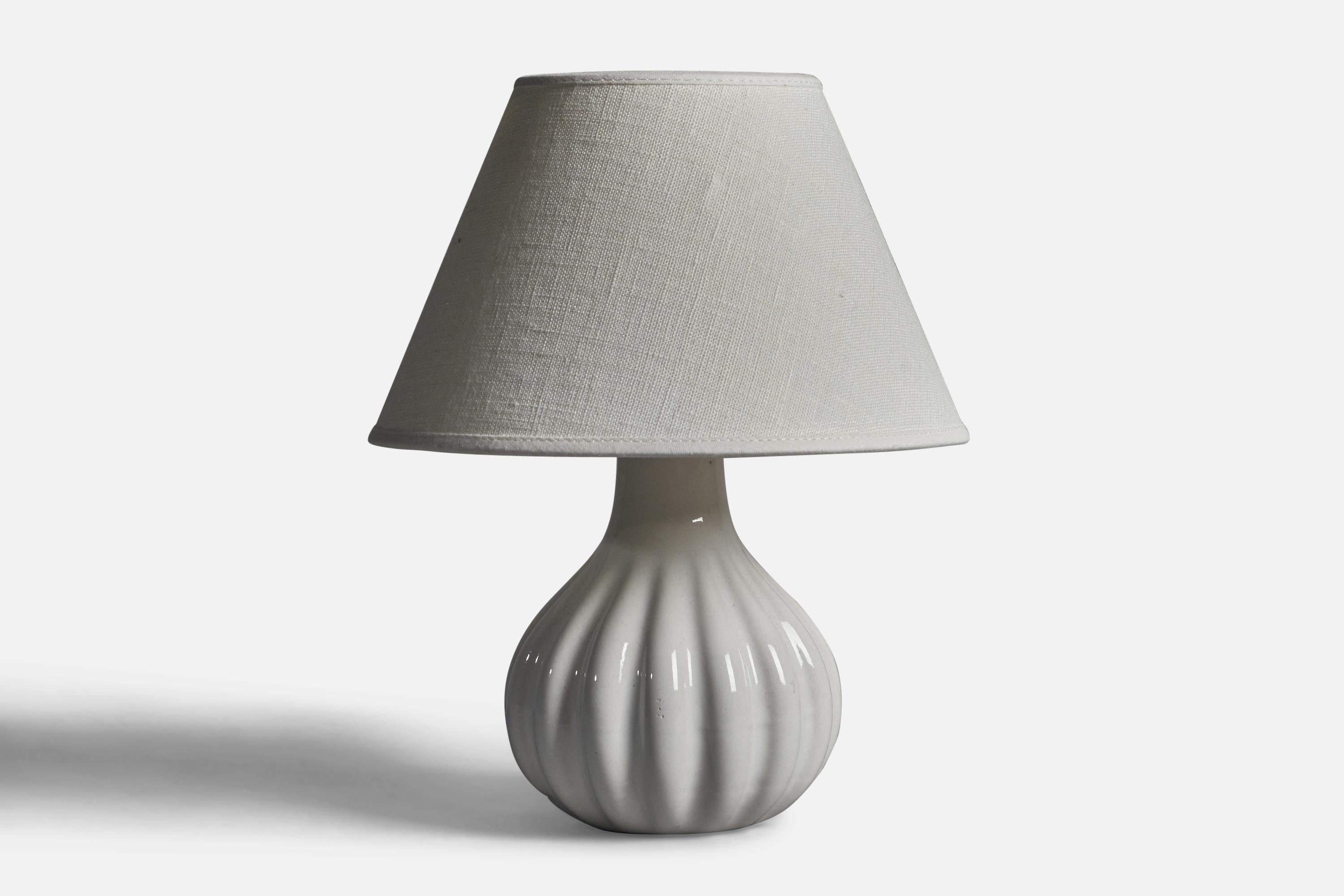 A grey-glazed fluted stoneware table lamp designed and produced in Sweden, 1960s.

Dimensions of Lamp (inches): 7.5