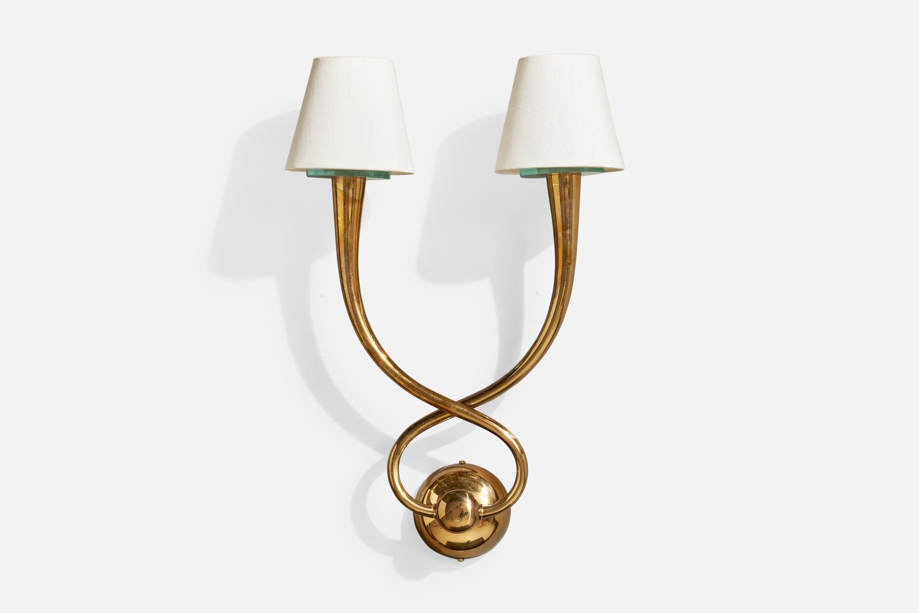 A brass, glass and white fabric wall light designed and produced by Egoluce Italy, c. 1980s.

Overall Dimensions (Inches): 20.5” H x 13.5” W x 7.5“ D

Back Plate Dimensions (Inches): 4” H x 4” W x 1.625” D

Bulb Specifications: E-14 candle

Number