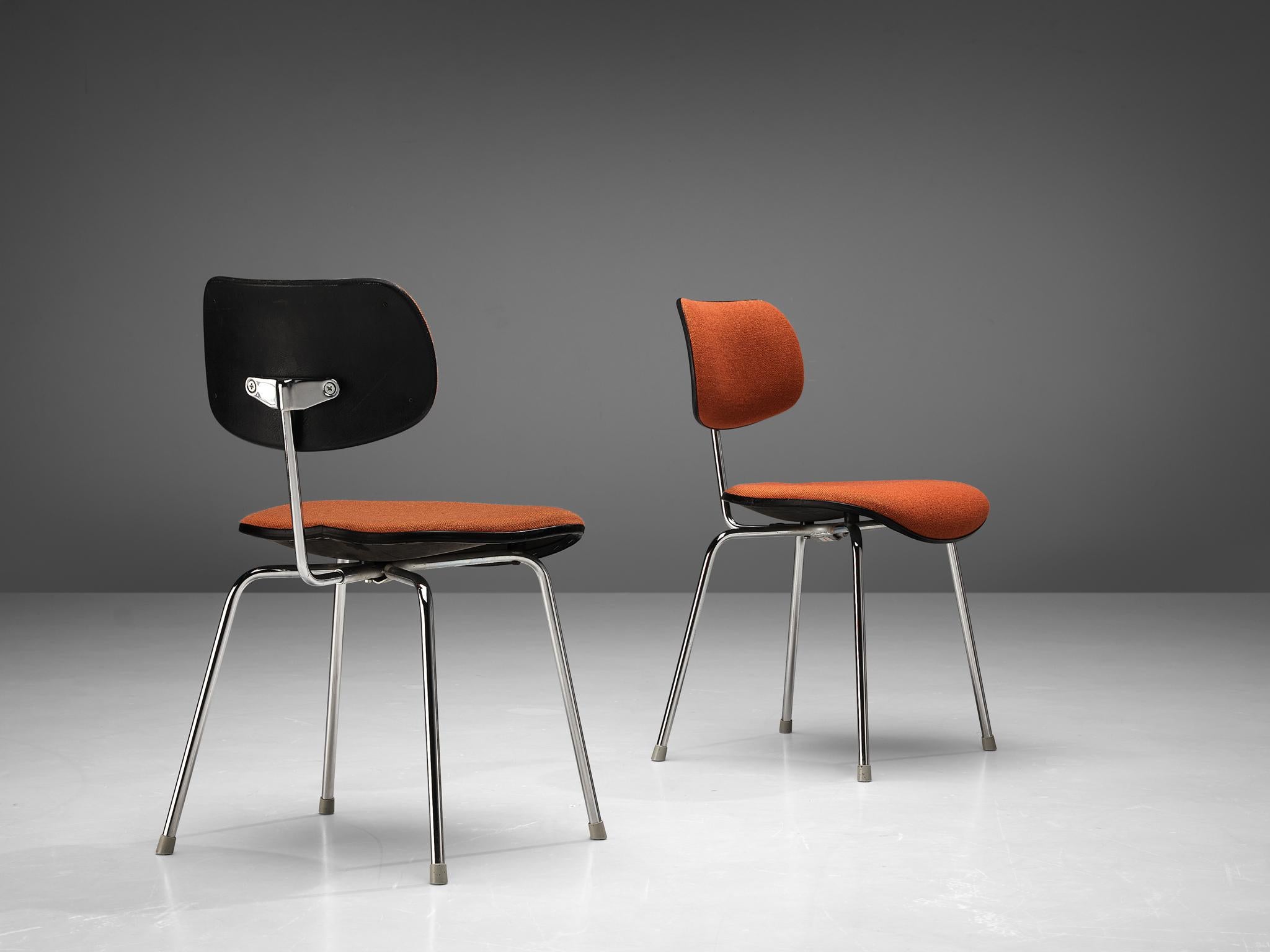 Egon Eiermann, dining or office chairs, model 'SE-68', fabric, chromed steel, Germany, design 1951 

The iconic SE 68 chair, designed by Egon Eiermann, exemplifies mid-century modern design. Its tubular steel frame is complemented by two organically