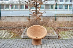 Egon Eiermann E10 Cane Basket Lounge Chair per Heinrich Murmann