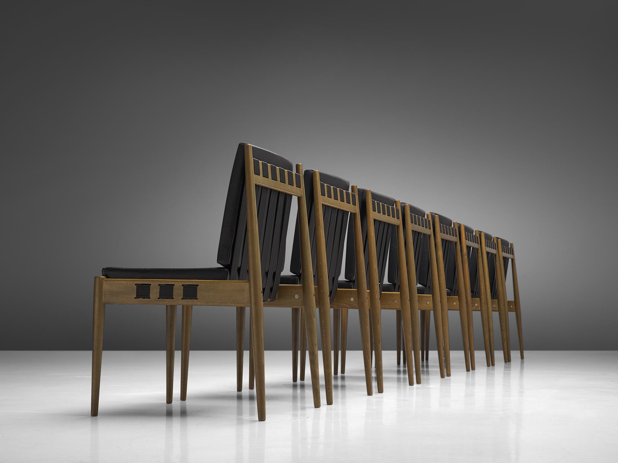 Egon Eiermann, set of eight dining chairs model SE121, beech, canvas, leatherette, Germany, design 1961

The versatile chair SE121 was originally designed for the interior of the Kaiser-Wilhelm-Gedächtniskirche in Berlin, of which Egon Eiermann
