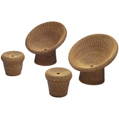 Egon Eiermann Zwei E10 Wicker Lounge Chairs mit Ottomane