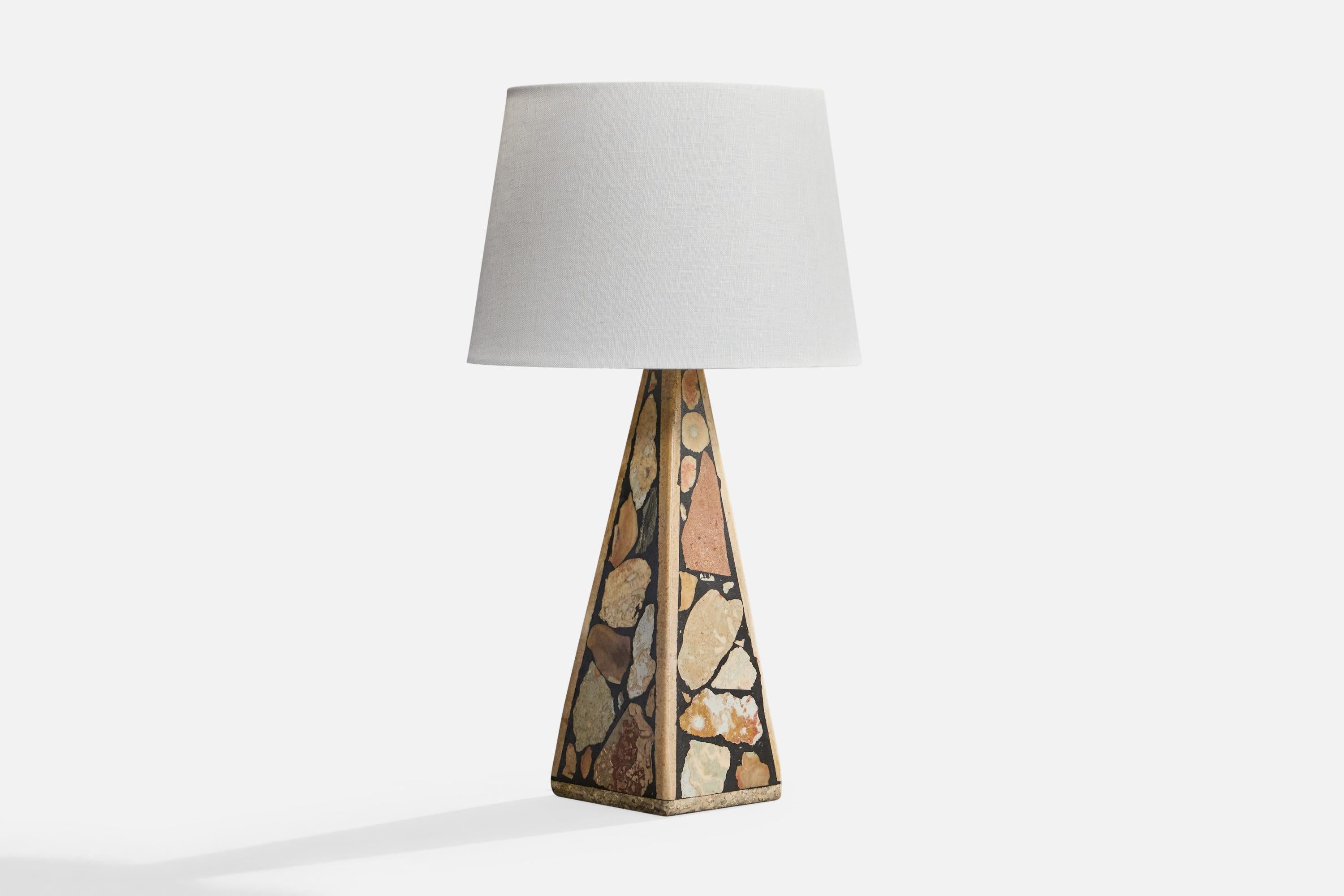 A fossil stone table lamp designed and produced by Egon Jakobsson, Gotland, Sweden, c. 1990s.

Dimensions of Lamp (inches): 14.25