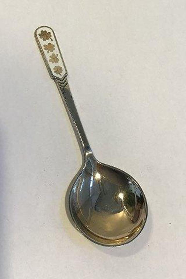 Egon Lauridsen sterling silver spoon with enamel.

Measure: 13,1cm / 5.15
