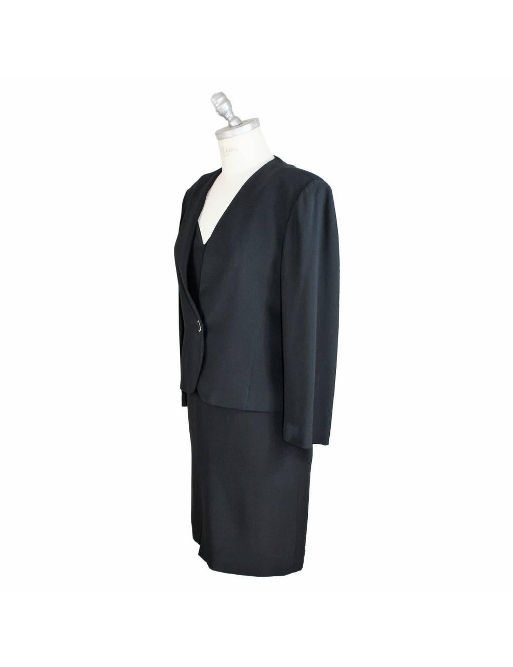 Vintage suit dress Egon Von Furstenberg brand, black, 100% viscose. The suit consists of dress and jacket, the sheath dress with shoulder pads covered with stones, the jacket closes with a jewel button. 90s. Made in Italy. Excellent vintage