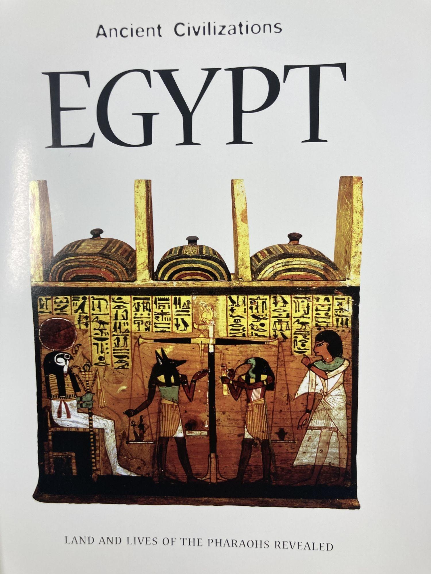 history book with white egyptian
