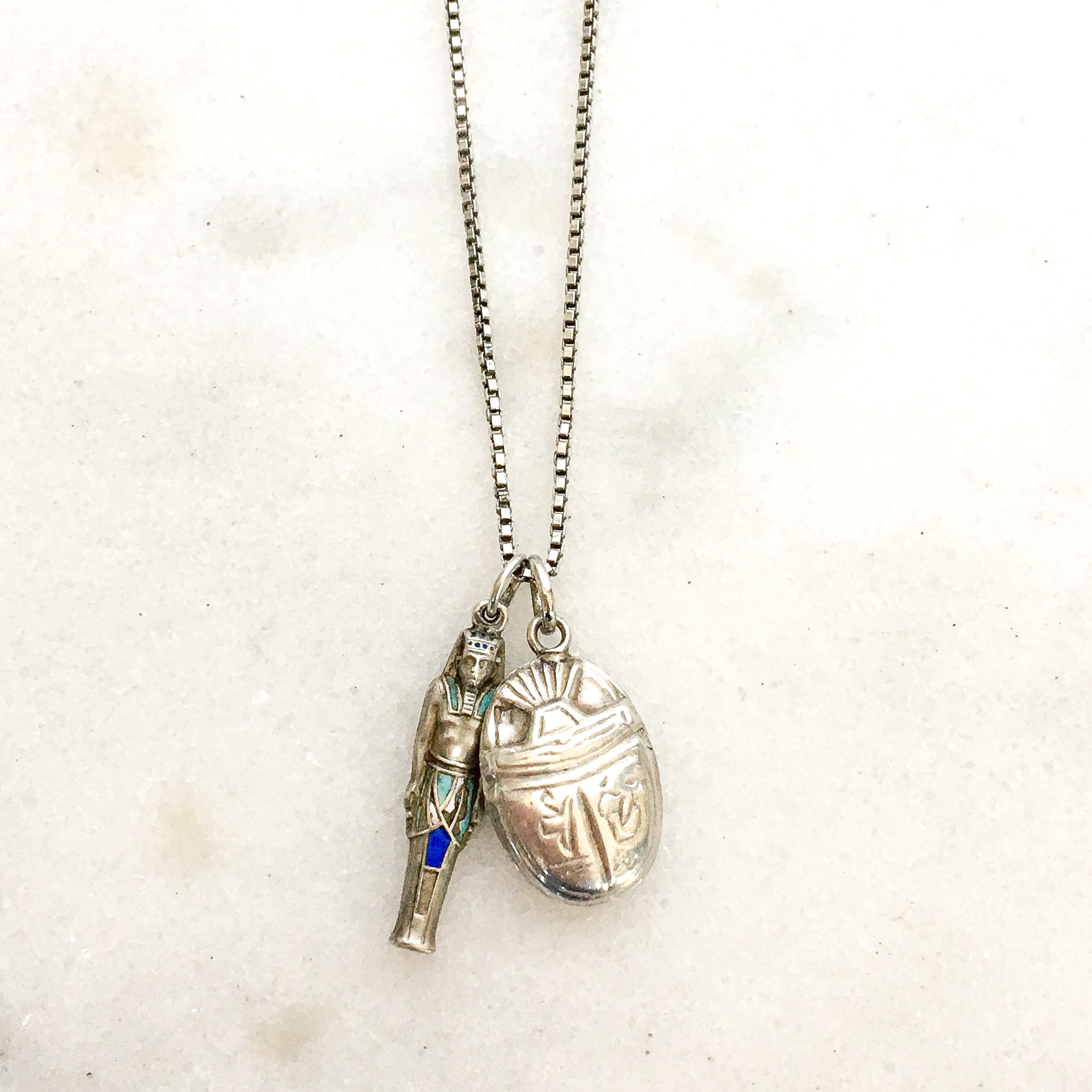 Three-dimensional silver and enameled charm of Egypt Pharaoh Ramses. The colors of this antique find are stunning with its cobalt blue, white and turquoise. Pharaoh Ramses makes a delightful gift for yourself or for someone who loves the Egypt