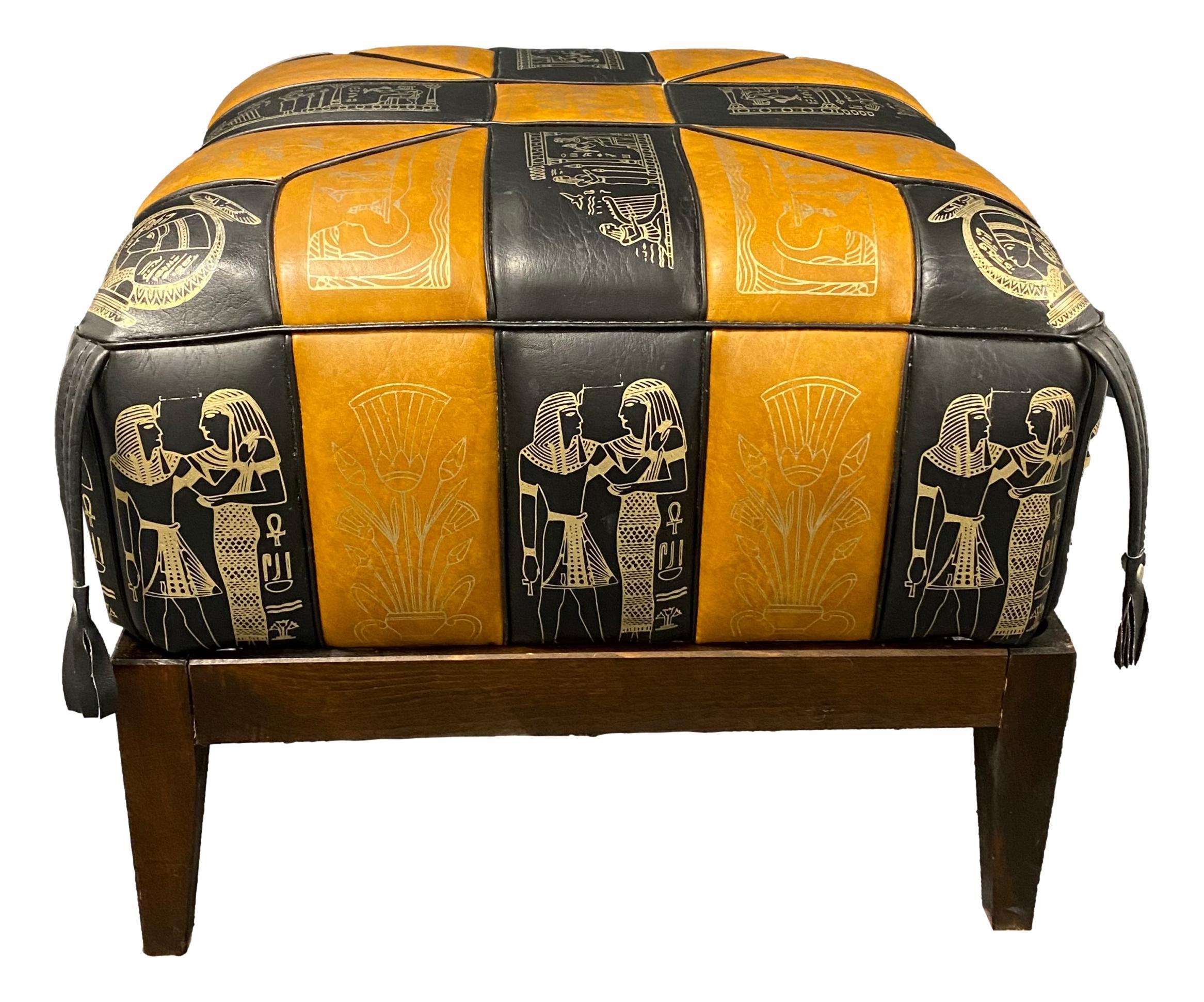 A beautiful leatherette footstool poof ottoman on a wooden frame. The leatherette poof is in a very good condition, wood with a nice patina, gives your living room a beautiful style.