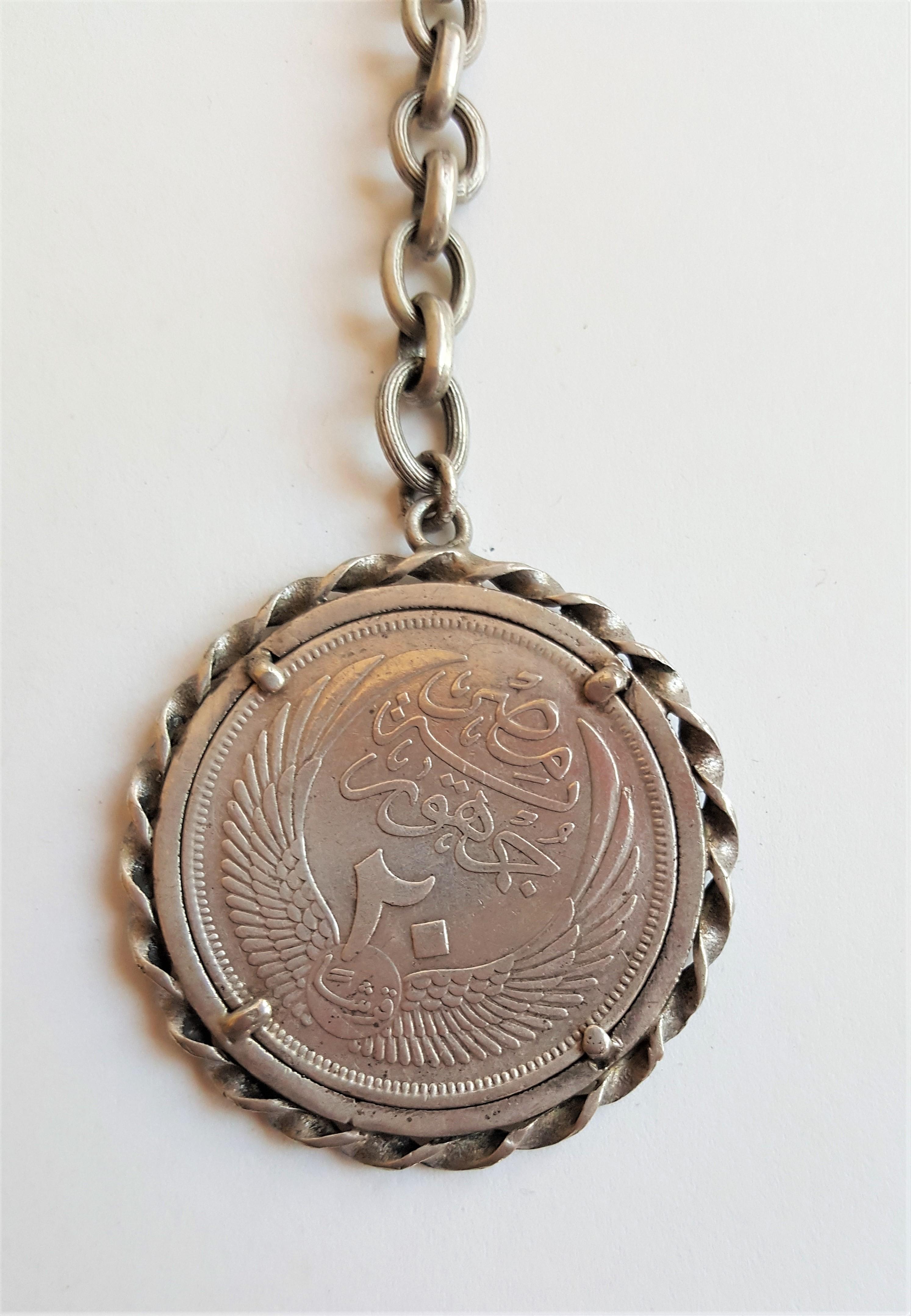 silver coin keychain