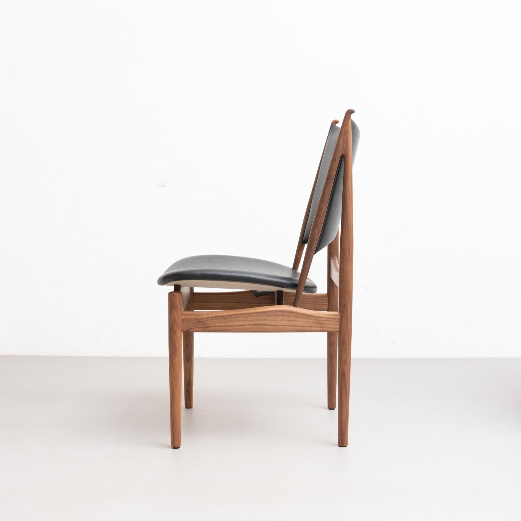 Contemporary Egyptian Armchair in Wood and Leather, by Finn Juhl
