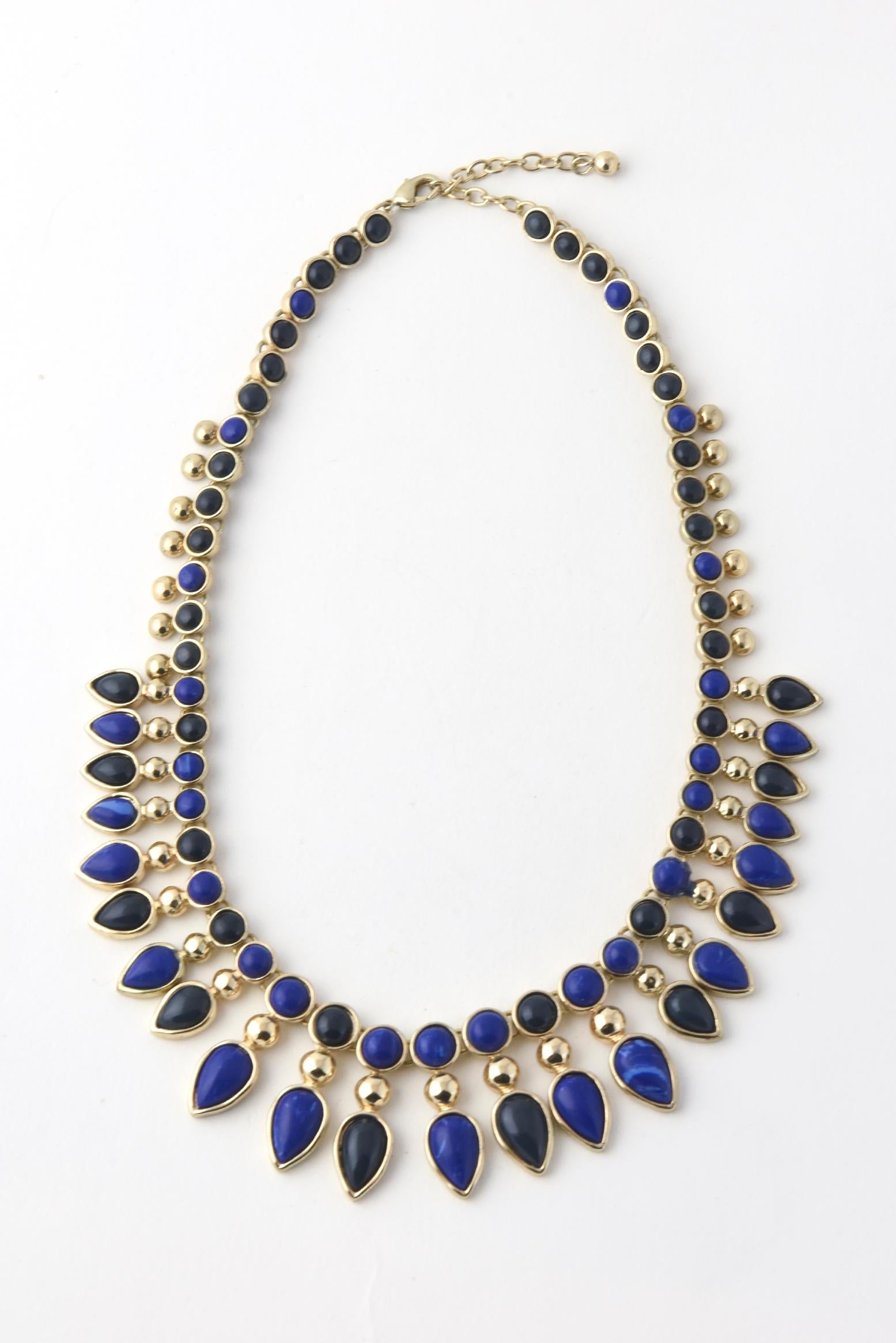 gold necklace with blue stone