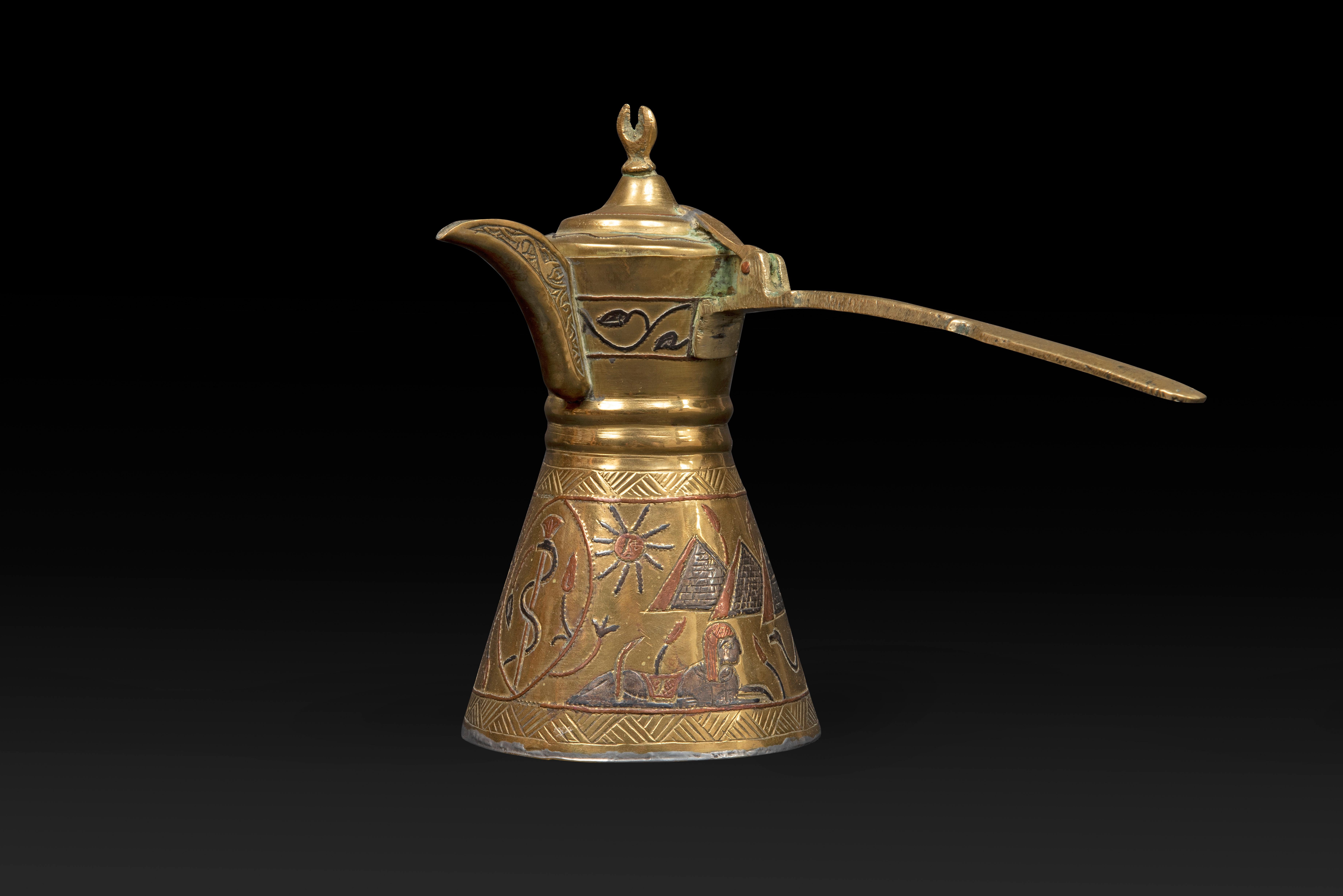 Egyptian Dallah Coffee Pot: A Symbol of Hospitality and Cultural Richness.

- Object:

A dallah (Arabic: دلة) is a traditional Arab coffee pot used to prepare and serve coffee in the Arabian Peninsula and the Persian Gulf. Due to its intimate