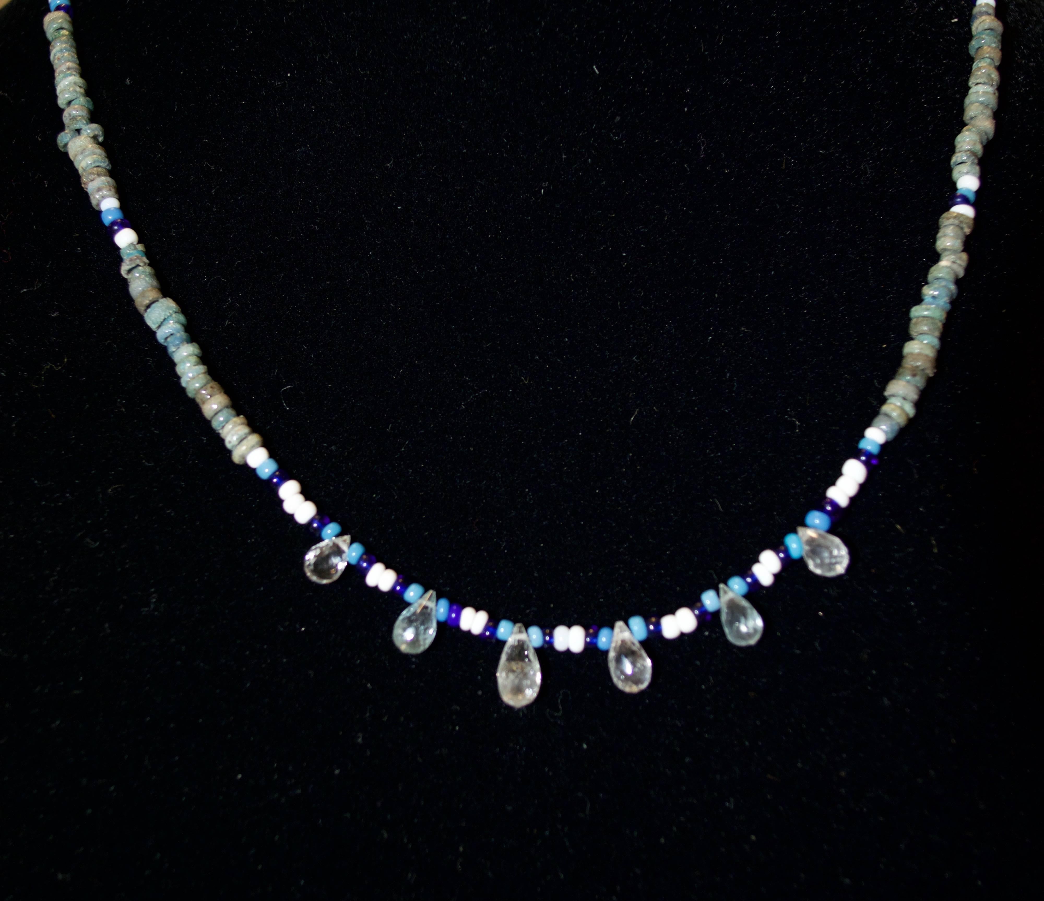 Original Egyptian Faience beads, Ca. 712-343 BC (only the green ones)  restrung with 6 contemporary citrine Briolettes interlaced with sky blue, white and dark blue beads. Modern new string and clasp.

This piece comes from our 