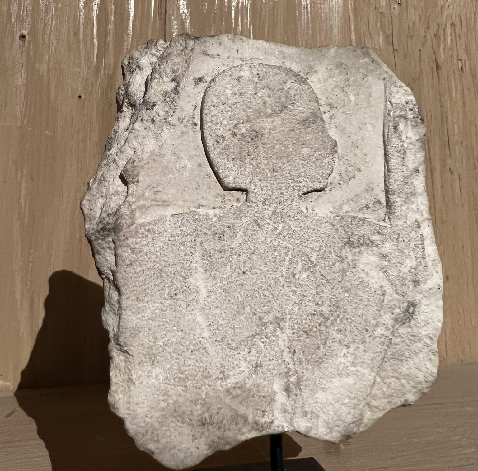 Egyptian figurative limestone architectural fragment  2