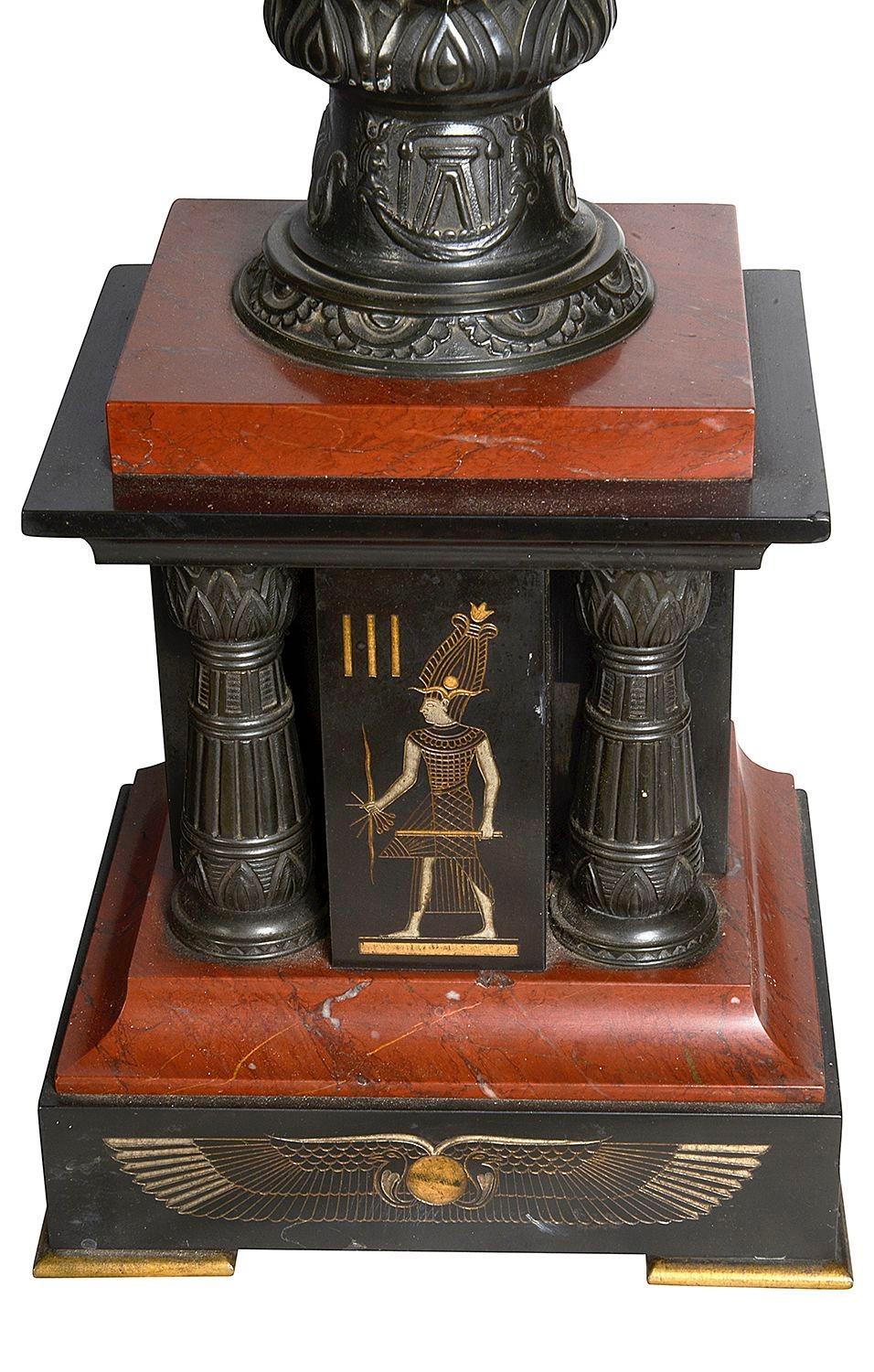 Egyptian Revival Egyptian influenced clock garniture, 19th Century. For Sale