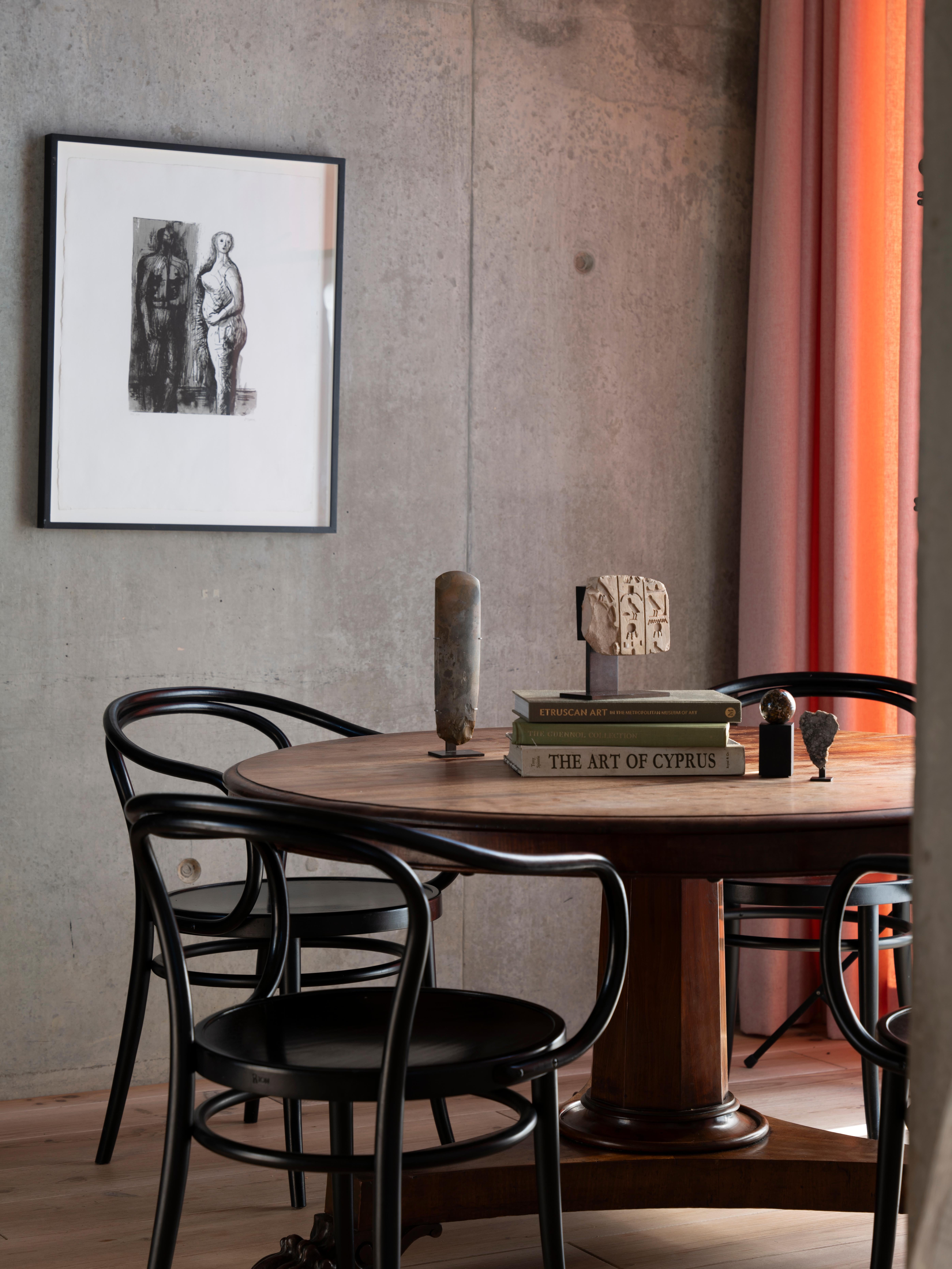 This beautiful New Kingdom limestone fragment, preserving three columns of deeply carved hieroglyphs, would have once accompanied elaborate pictorial depictions on the walls of a temple or tomb in ancient Egypt. Remains of pinkish-red pigment hint