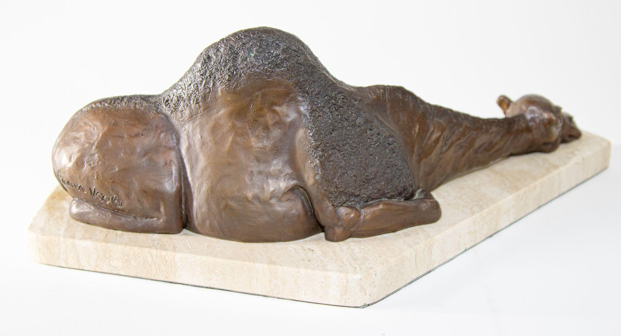 Egyptian Middle Eastern Resting Camel Sculpture on Marble Stand In Excellent Condition For Sale In North Hollywood, CA