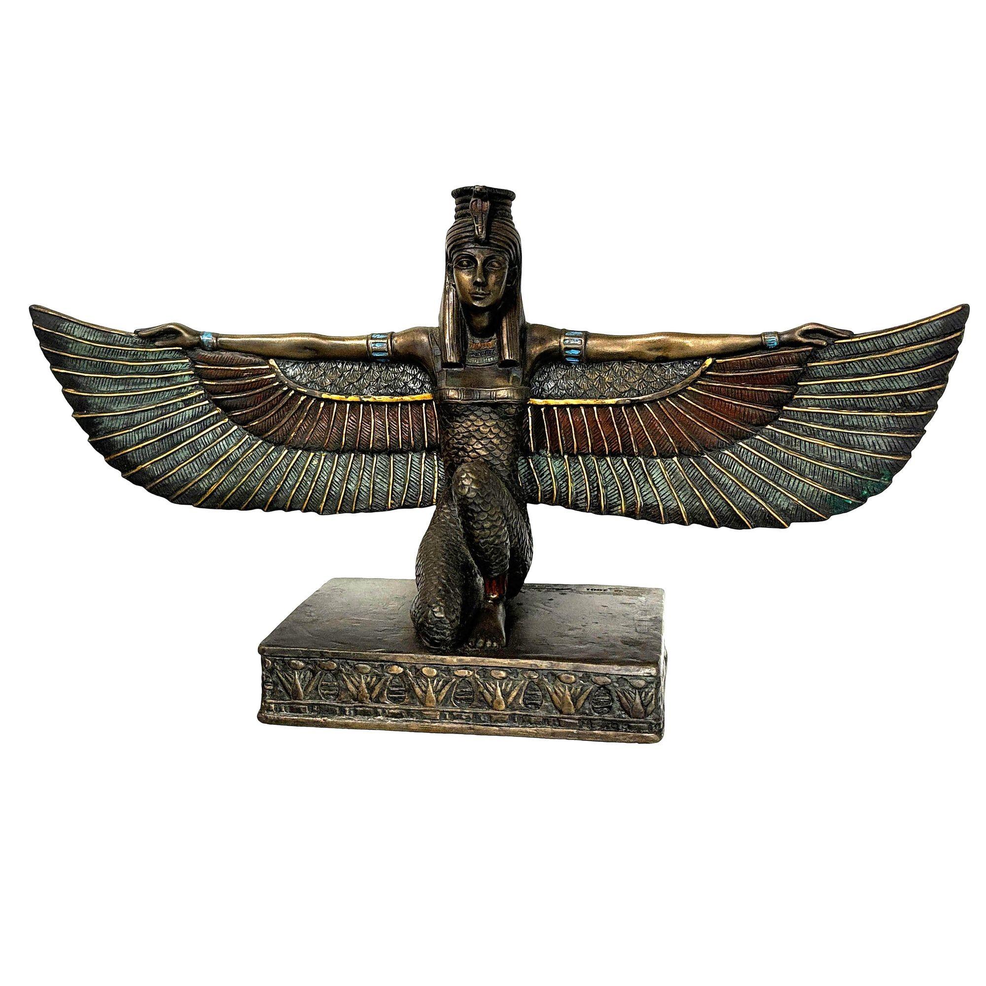 This brass tabletop sculpture depicts the Egyptian goddess of motherhood, protection, and healing known as Isis. Intricately detailed, the piece showcases traditional Egyptian iconography with hieroglyphs and symbolic imagery. Its compact size makes