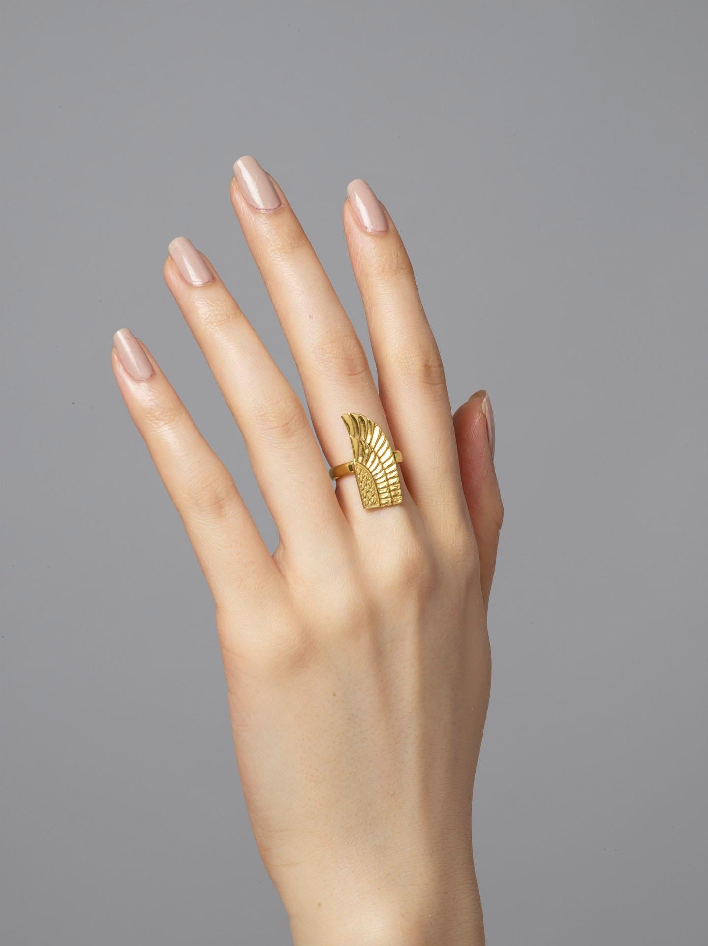 This wing is inspired by the Goddess Isis who was worshiped in Ancient Egypt for being the ideal mother and wife alongside being the patroness of nature and magic. This polished 18k gold wing has three diamonds to symbolise the pleiades.

Carved by