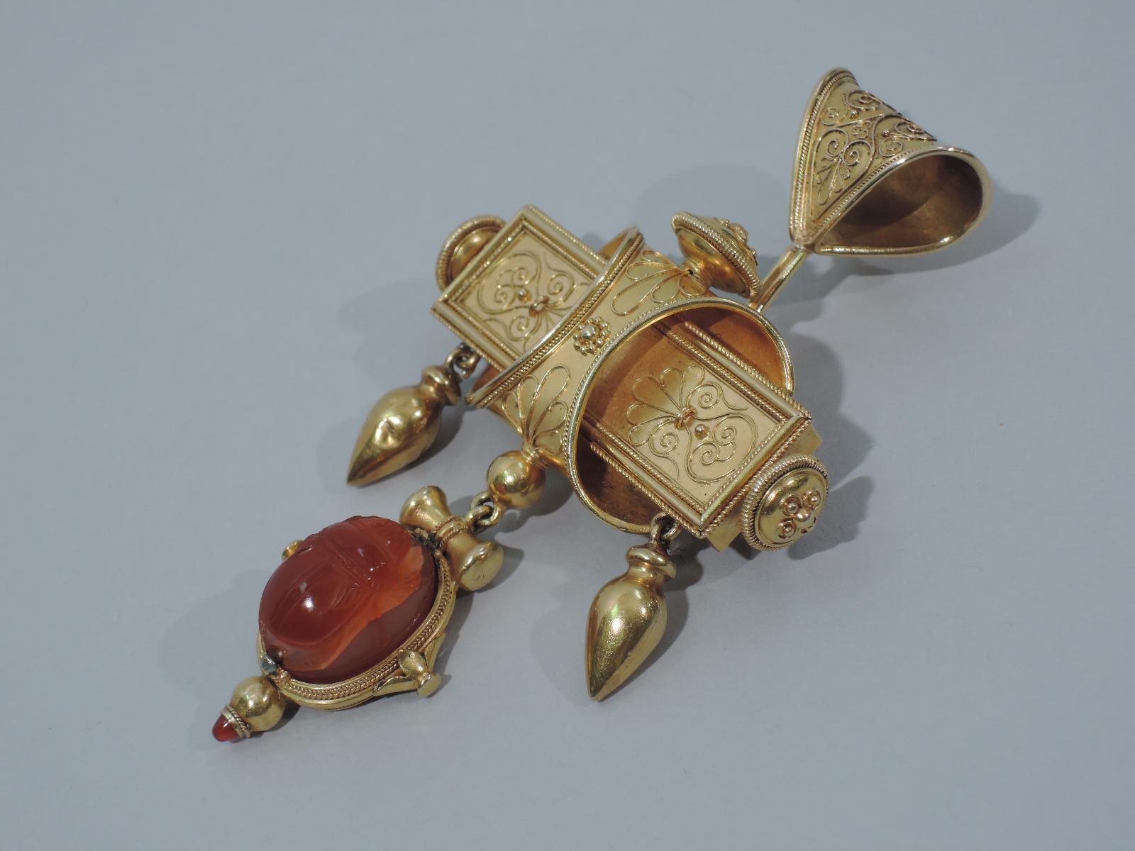 Italian 18K gold pendant with scarab, ca. 1860. Carved cornelian scarab on gold mount with applied filigree and rope ornament. Can be worn as brooch.