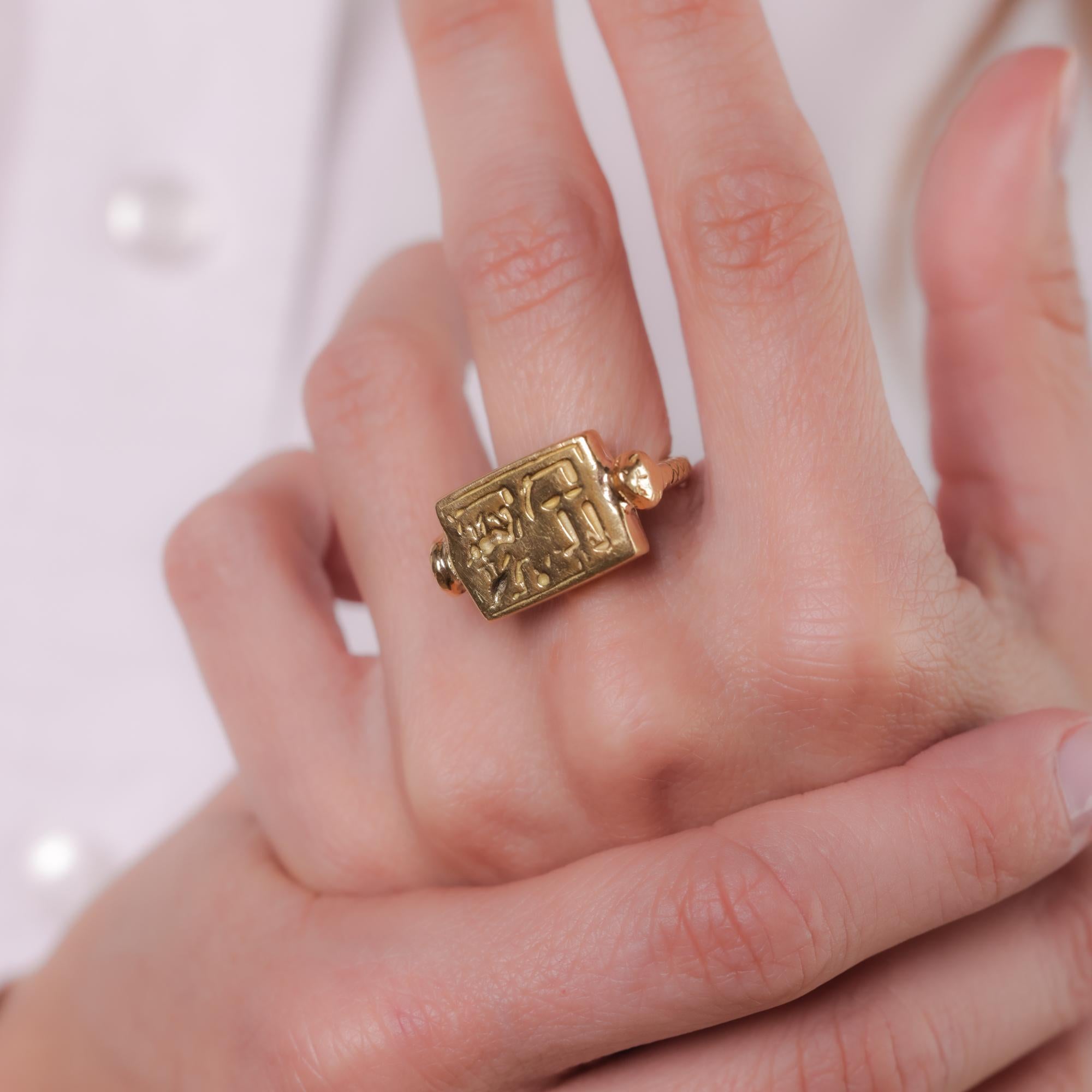 Egyptian revival 18k yellow gold hieroglyphic snake ring In Excellent Condition In Beverly Hills, CA