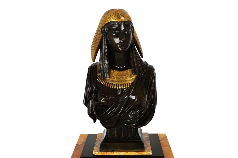 An incredibly fine casting of Isis, this coveted model is a rare find on the open market. The queen is depicted with a cool and calm demeanor, her eyes betraying no emotion or sentiment as she looks to an infinite point in the distance. Her attire