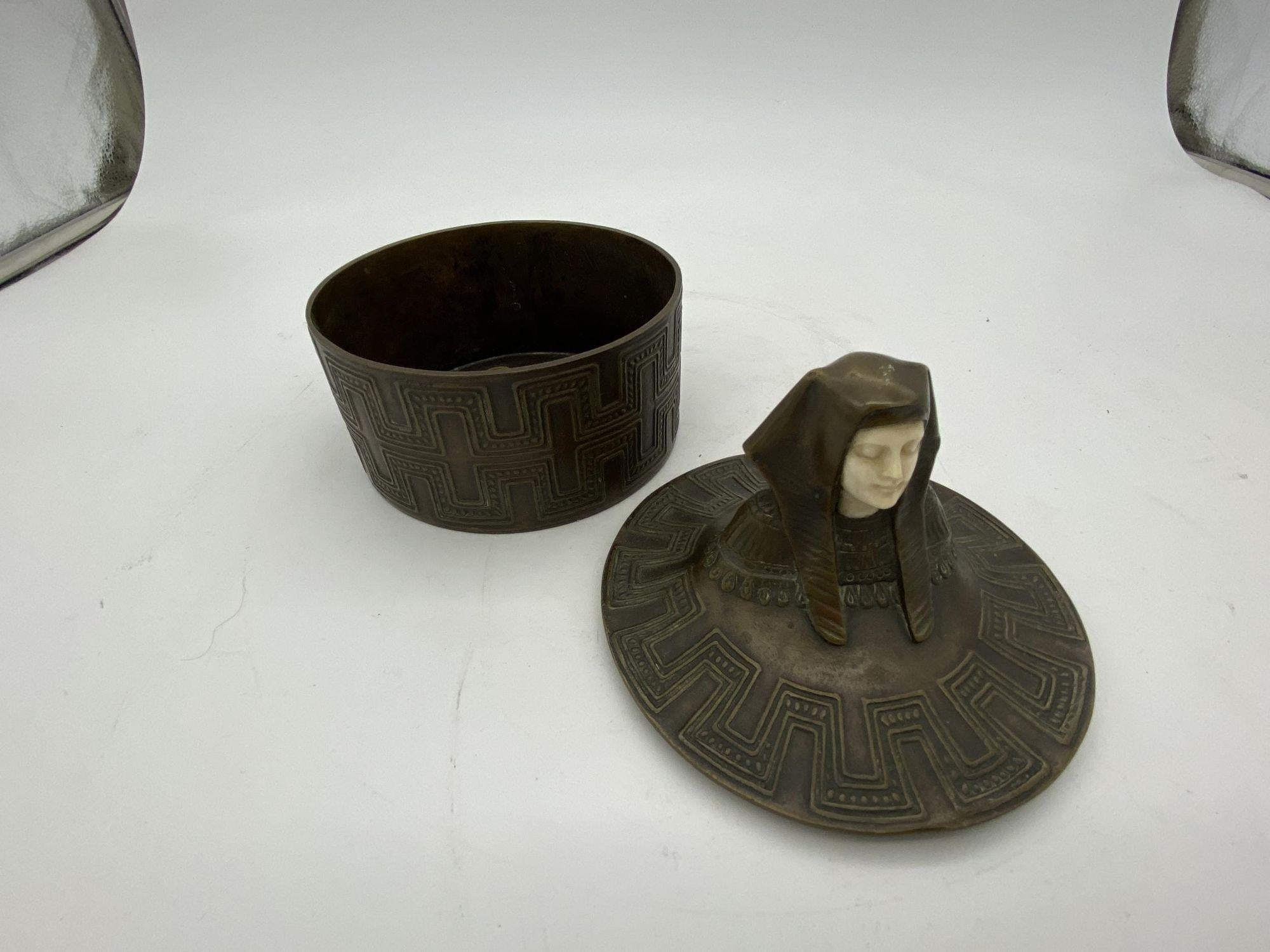 Egyptian Revival Bronze Round Pharaoh Case W/ Carved Bone Face, Circa 1920 For Sale 1