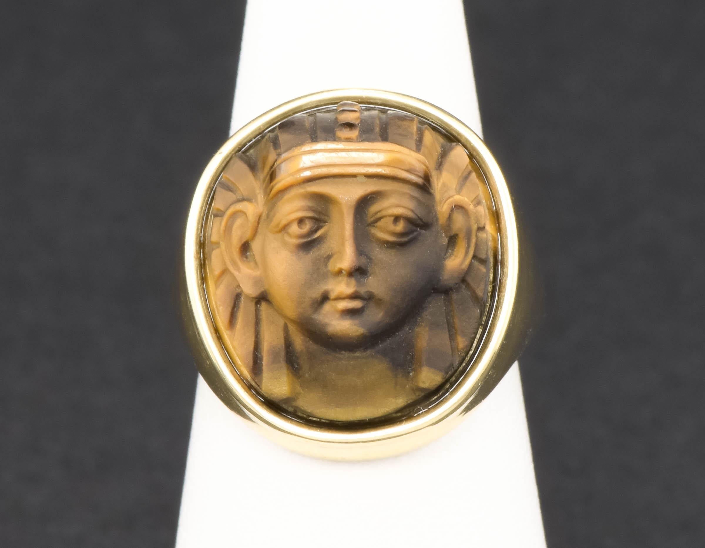 One of my all time favorite antique conversion pieces - this substantial and very striking gold signet ring uses part of a beautifully carved antique tiger's eye stick pin. King Tut's tomb was discovered in 1922, so I suspect the carved portrait