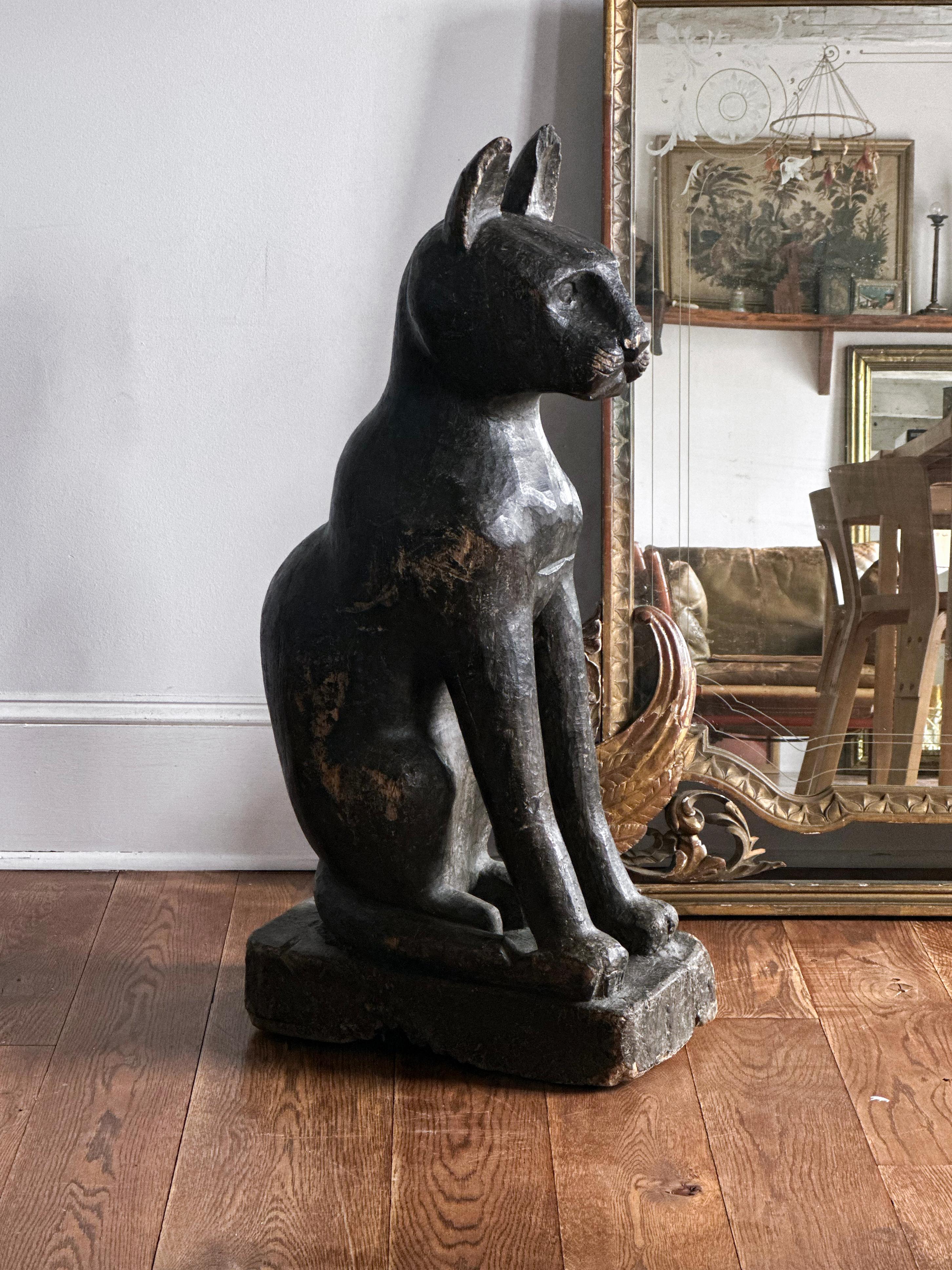 Egyptian revival carved wood Cat, Bastet C.1900

Impressive scale. Beautiful Patina. Great style. 