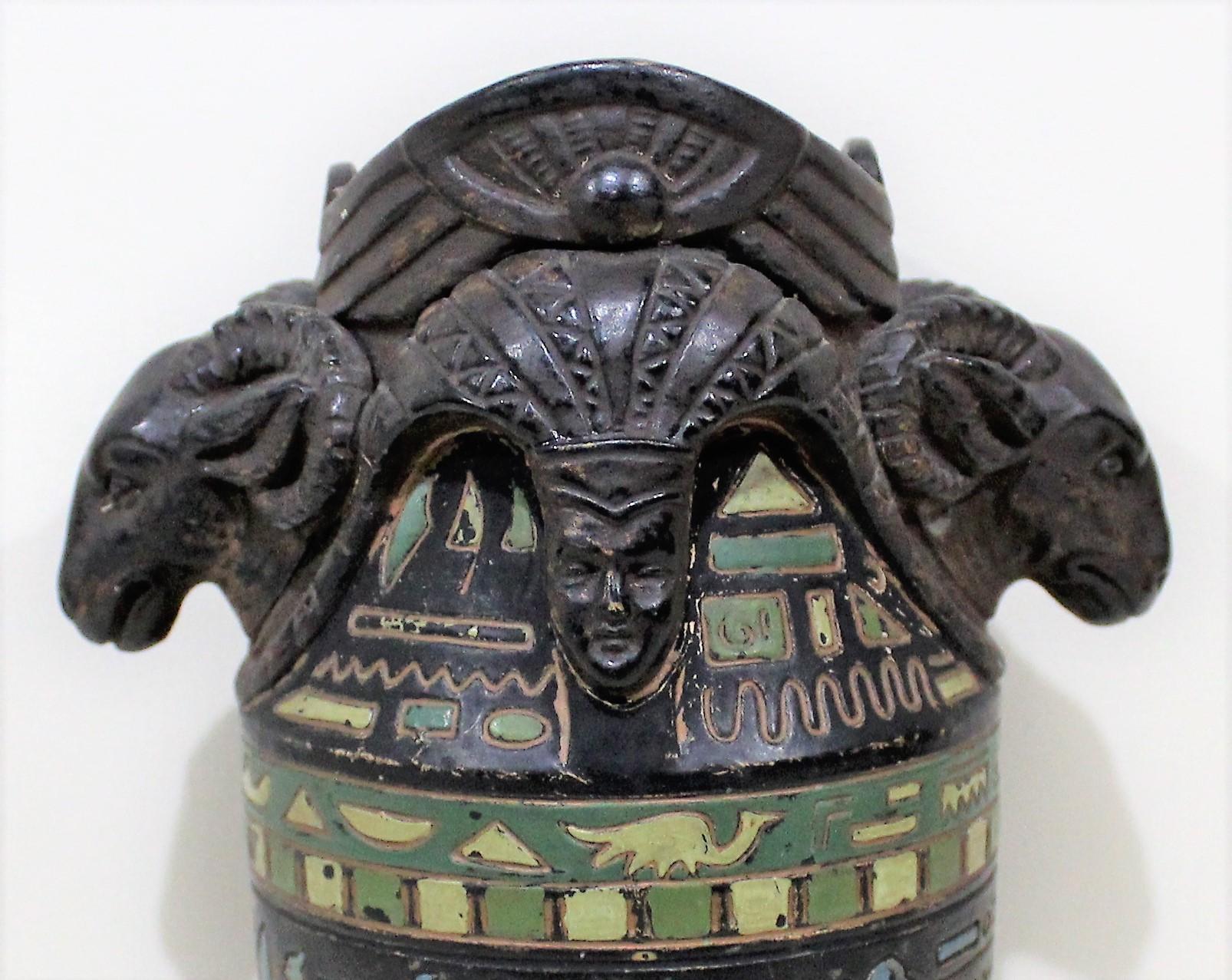 Egyptian Revival cold painted ceramic figural vase with rams heads & hieroglyphics.