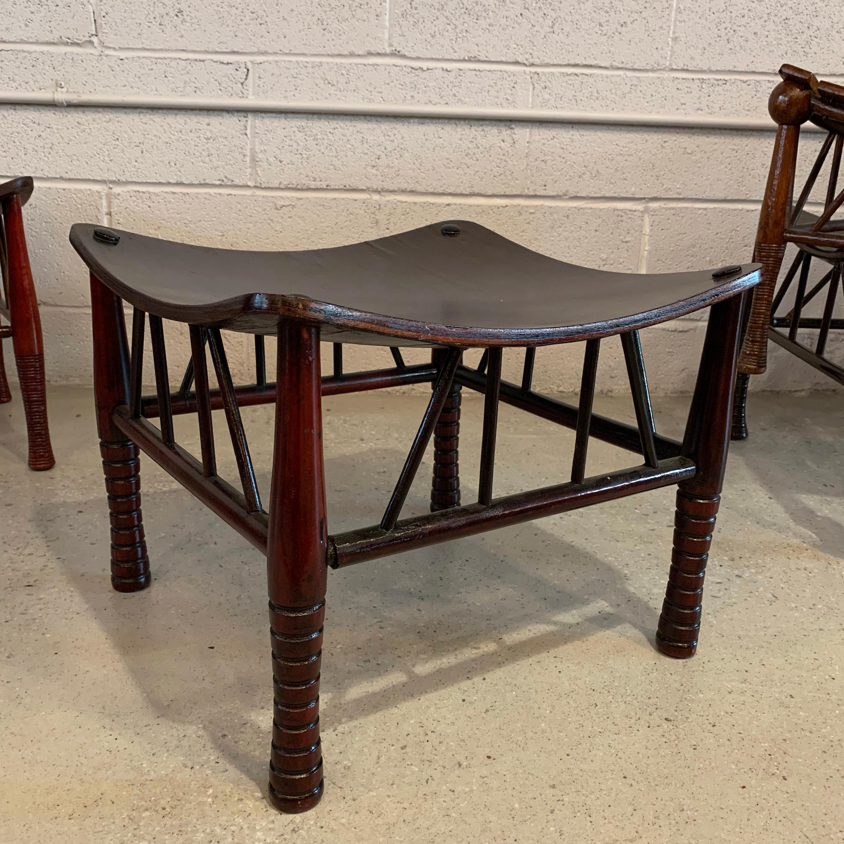 Early 20th century, Egyptian Revival, dark maple, Thebes stool styled after the stools of ancient Egyptian royalty, attributed to Liberty & Co.