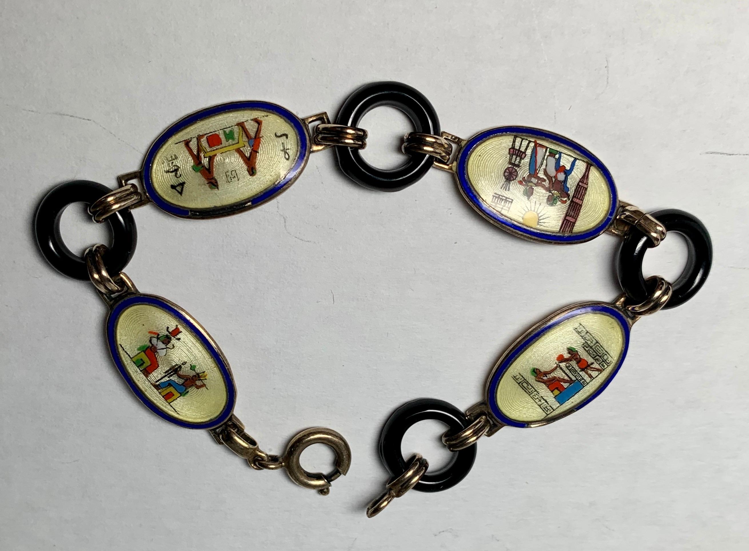 THIS IS A STUNNING EGYPTIAN REVIVAL BRACELET DATING TO THE ART DECO PERIOD WITH MAGNIFICENT IMAGES IN GUILLOCHE ENAMEL OVER STERLING SILVER - A RARE MUSEUM QUALITY BRACELET AND DATING TO CIRCA 1910-1930!
This bracelet is truly magnificent.  And it
