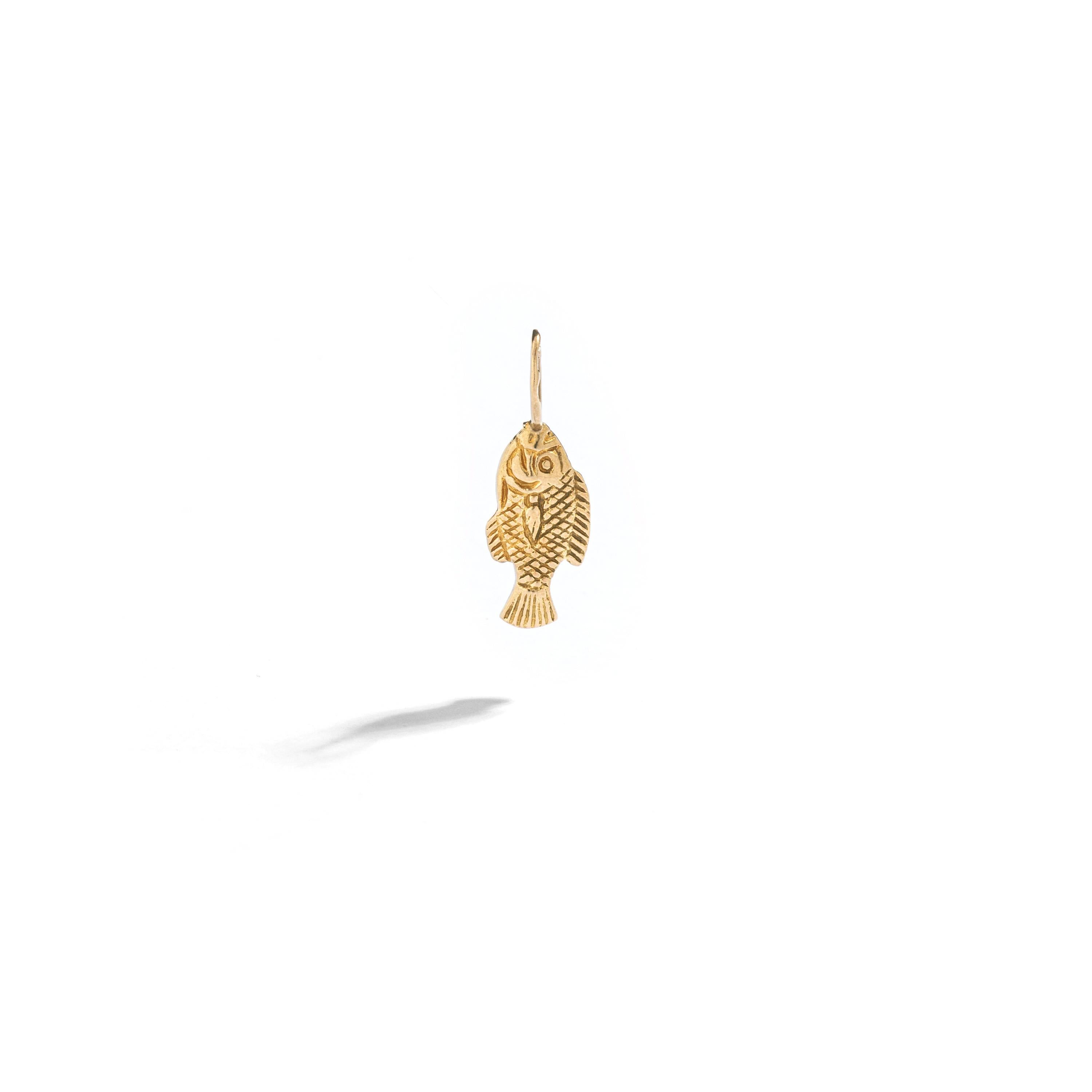 Fish Yellow Gold 18k Charm.
Egyptian revival.

Total length: 0.83 inch (2.10 centimeters) including bail.
Total weight: 1.71 grams.