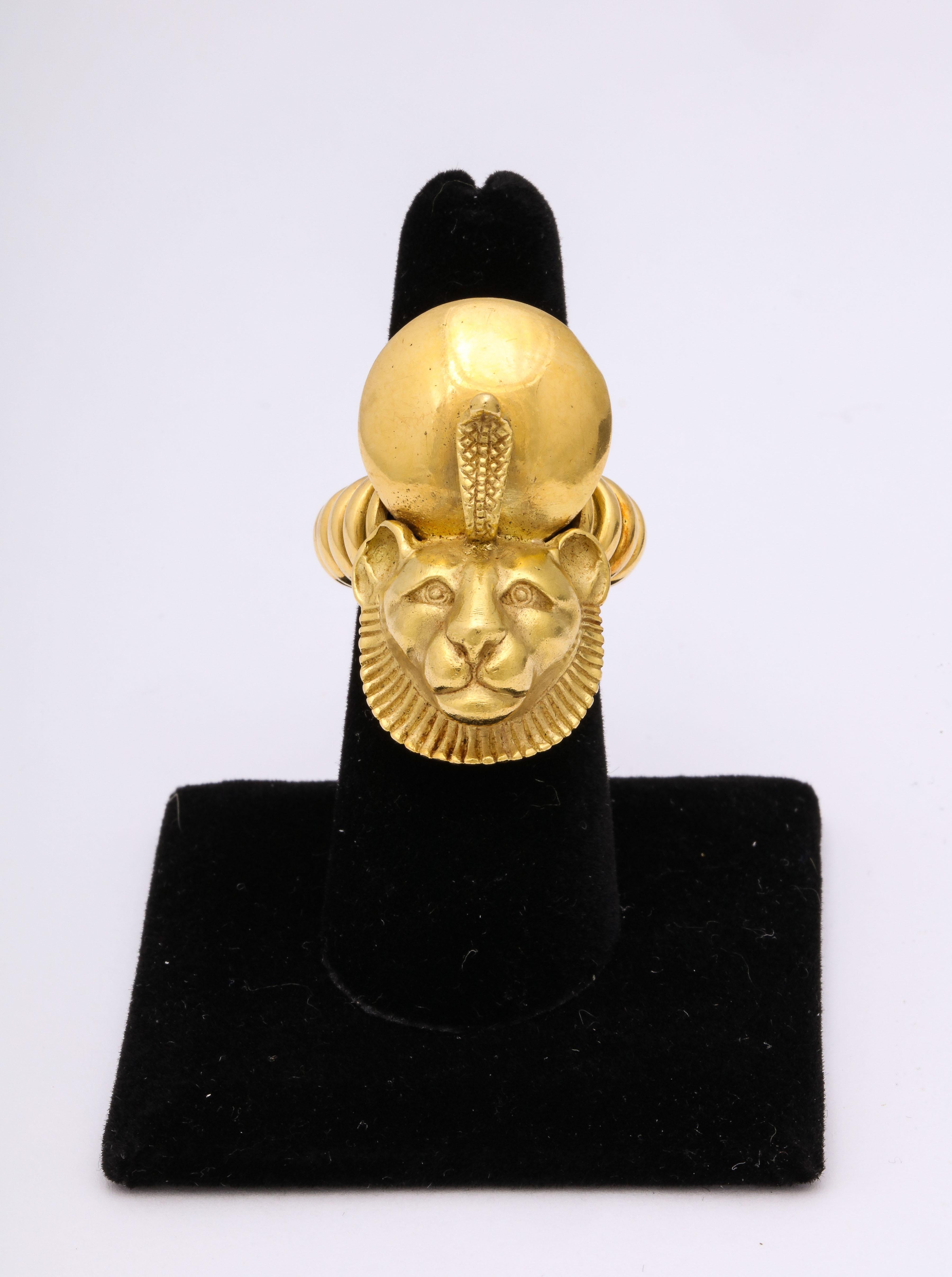 Talk about being the Queen of the Nile.  Cleopatra - watch out!  Heavily influenced by Italian Egyptiana and Elizabeth Taylor.  Sekhmet head with the cobra Uranus backed by the Sun Disk  and resting on a wide ribbed shank - this ring is 18kt Yellow